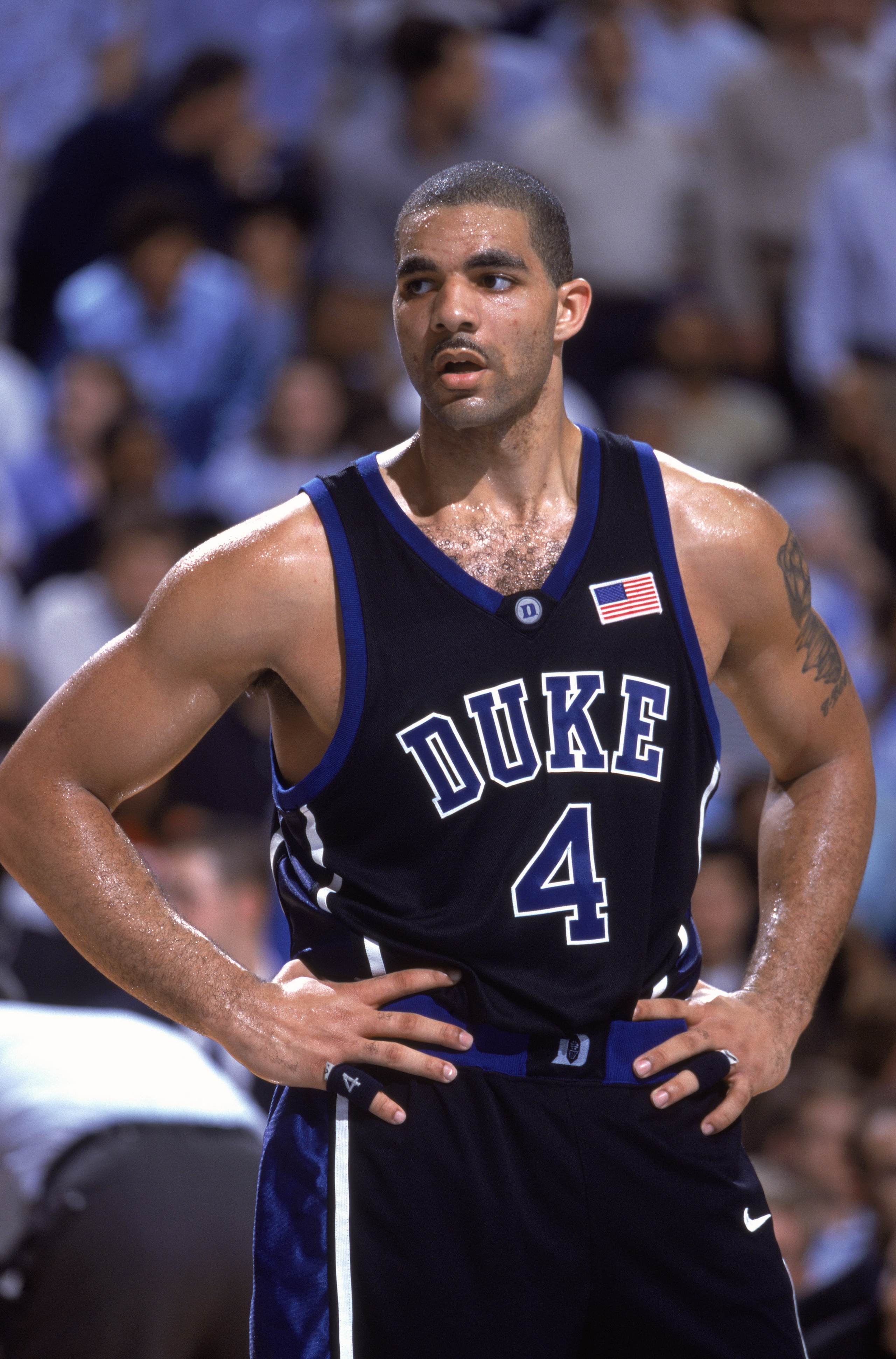 31 Jan 2002: Carlos Boozer #4 of the Duke Blue Devils rests during the ACC Conference basketball game against the North Carolina Tar Heels at the Dean Smith Center in Chapel Hill, North Carolina. The Blue Devils embarrassed the Tar Heels 87-58. \ Manda 31 Jan 2002: Carlos Boozer #4 of the Duke Blue Devils rests during the ACC Conference basketball game against the North Carolina Tar Heels at the Dean Smith Center in Chapel Hill, North Carolina. The Blue Devils embarrassed the Tar Heels 87-58. \ Manda