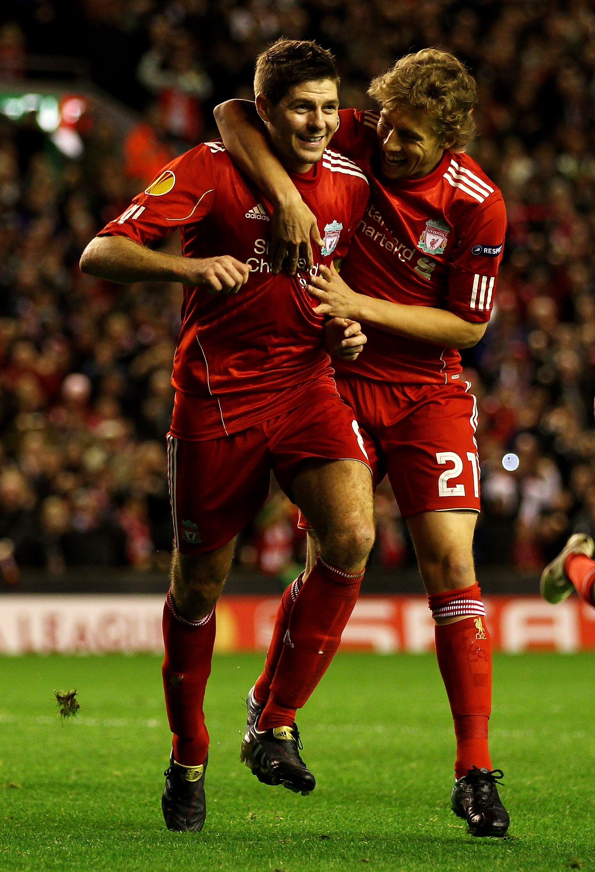 LIVERPOOL, ENGLAND - NOVEMBER 04:  Steven Gerrard of Liverpool celebrates scoring his team's third goal and his hat trick with team mate Lucas (R) during the UEFA Europa League Group K match beteween Liverpool and SSC Napoli at Anfield on November 4, 2010