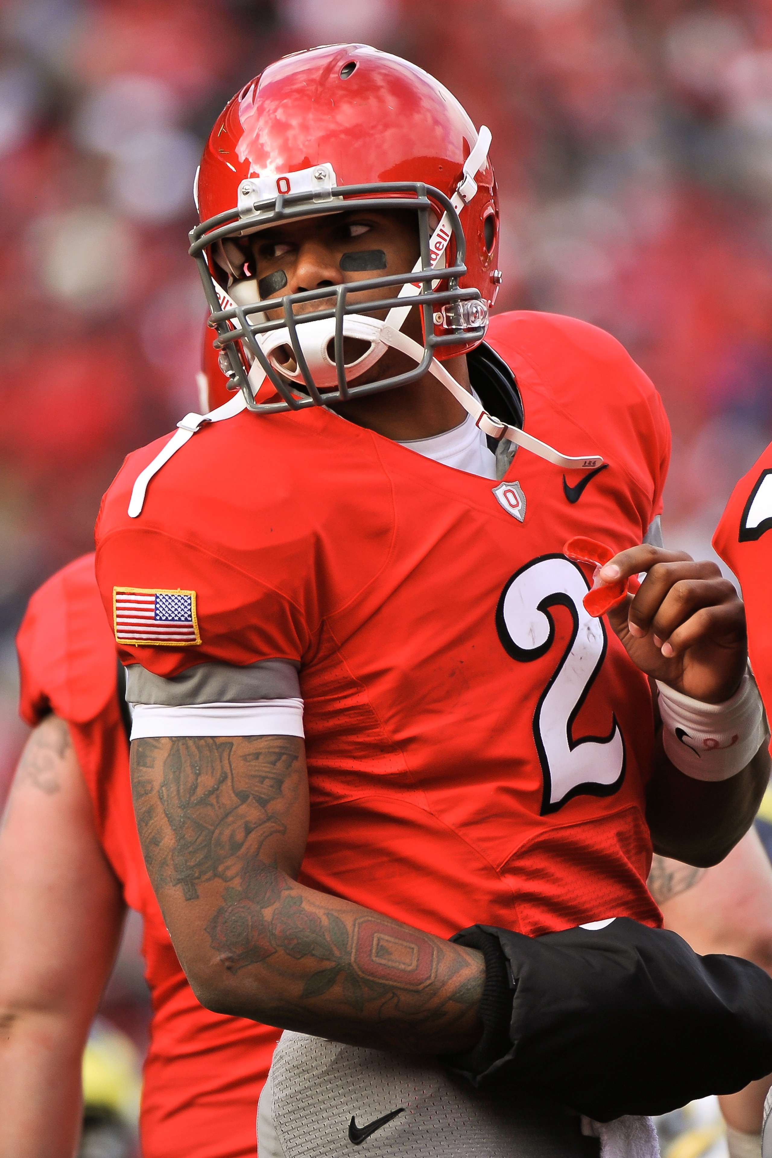 COLUMBUS, OH - NOVEMBER 27: Quarterback Terrelle Pryor #2 of the Ohio State Buckeyes gets ready to call the play in the huddle against the Michigan Wolverines at Ohio Stadium on November 27, 2010 in Columbus, Ohio. (Photo by Jamie Sabau/Getty Images) COLUMBUS, OH - NOVEMBER 27: Quarterback Terrelle Pryor #2 of the Ohio State Buckeyes gets ready to call the play in the huddle against the Michigan Wolverines at Ohio Stadium on November 27, 2010 in Columbus, Ohio. (Photo by Jamie Sabau/Getty Images)