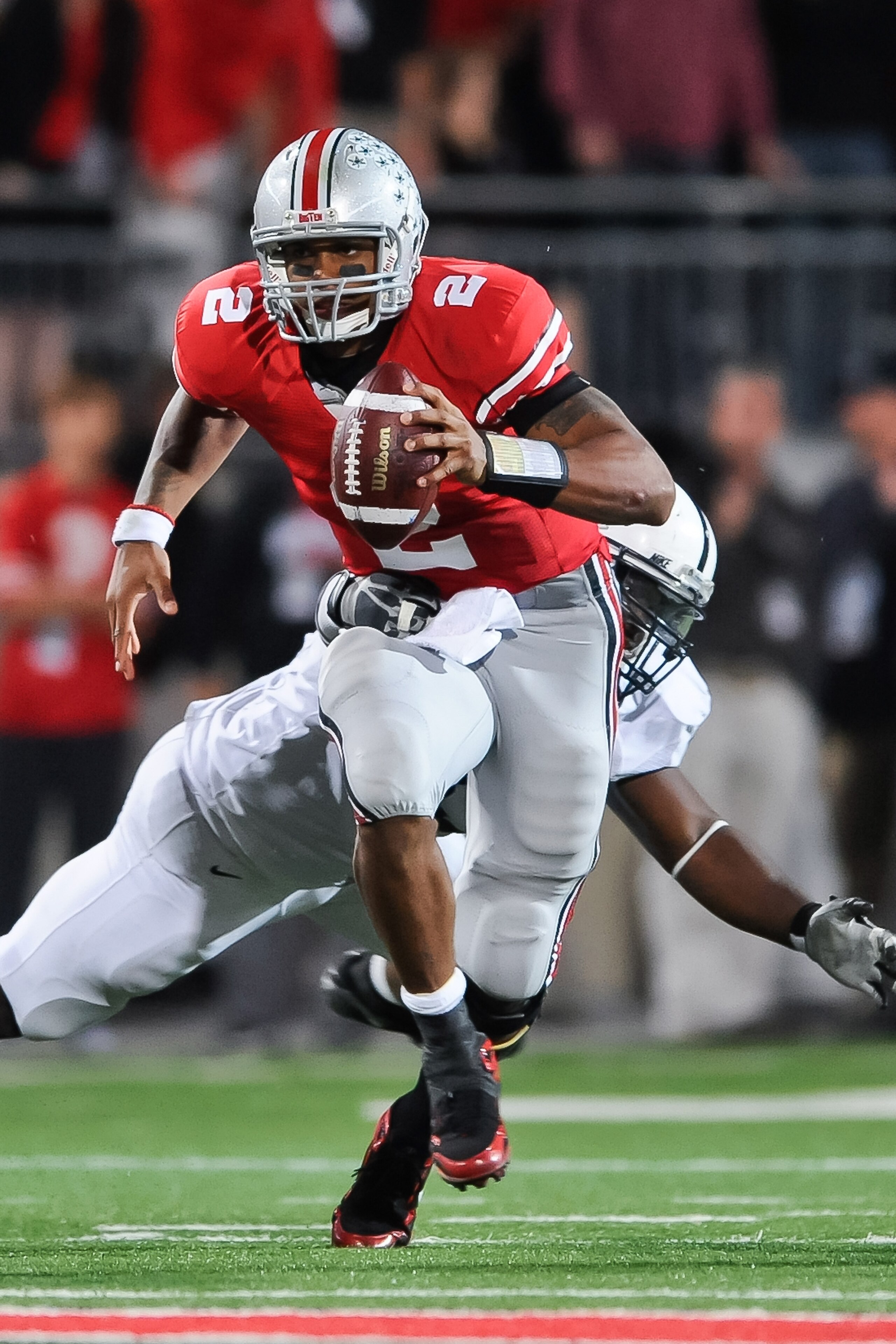 COLUMBUS, OH - NOVEMBER 13: Quarterback Terrelle Pryor #2 of the Ohio State Buckeyes runs with the ball against the Penn State Nittany Lions at Ohio Stadium on November 13, 2010 in Columbus, Ohio. (Photo by Jamie Sabau/Getty Images) COLUMBUS, OH - NOVEMBER 13: Quarterback Terrelle Pryor #2 of the Ohio State Buckeyes runs with the ball against the Penn State Nittany Lions at Ohio Stadium on November 13, 2010 in Columbus, Ohio. (Photo by Jamie Sabau/Getty Images)