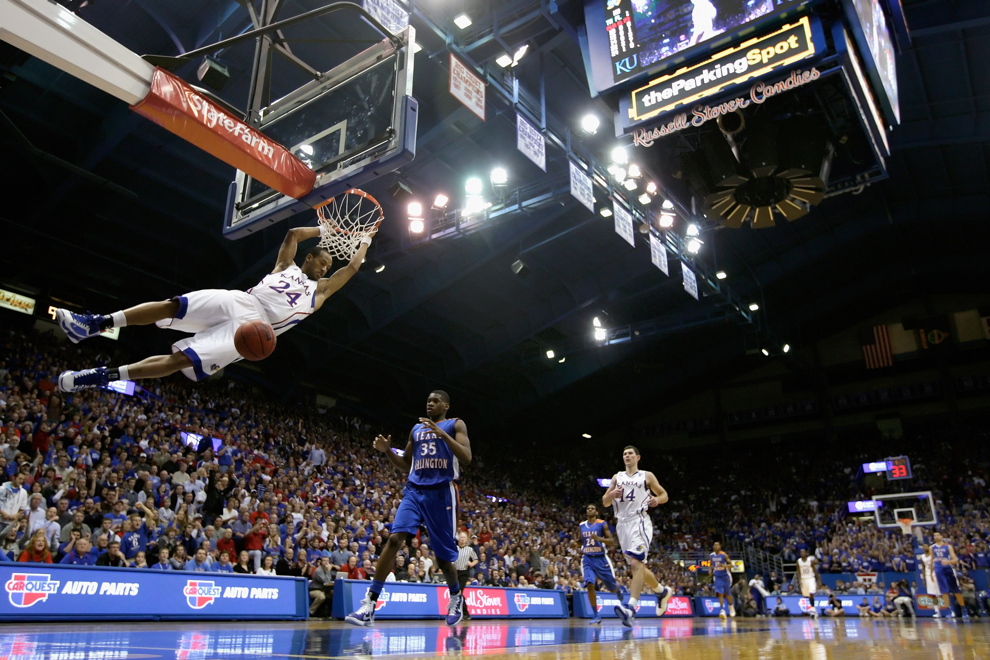 LAWRENCE, KS - DECEMBER 29:  Travis Releford #24 of the Kansas Jayhawks dunks during the game against the University of Texas Arlington Mavericks on December 29, 2010 at Allen Fieldhouse in Lawrence, Kansas.  (Photo by Jamie Squire/Getty Images)