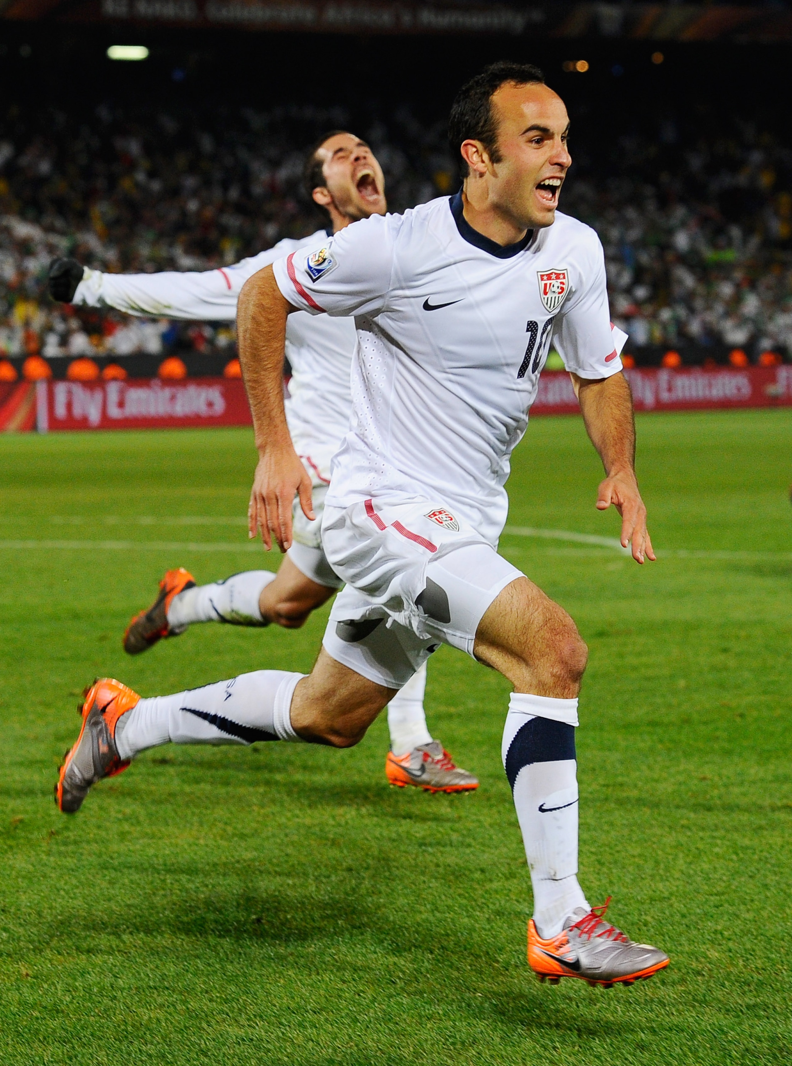 PRETORIA, SOUTH AFRICA - JUNE 23: Landon Donovan and Benny Feilhaber of USA celebrate Donovan's winning goal against Algeria, 1-0, during the 2010 FIFA World Cup South Africa Group C match between USA and Algeria at the Loftus Versfeld Stadium on June 23 PRETORIA, SOUTH AFRICA - JUNE 23: Landon Donovan and Benny Feilhaber of USA celebrate Donovan's winning goal against Algeria, 1-0, during the 2010 FIFA World Cup South Africa Group C match between USA and Algeria at the Loftus Versfeld Stadium on June 23