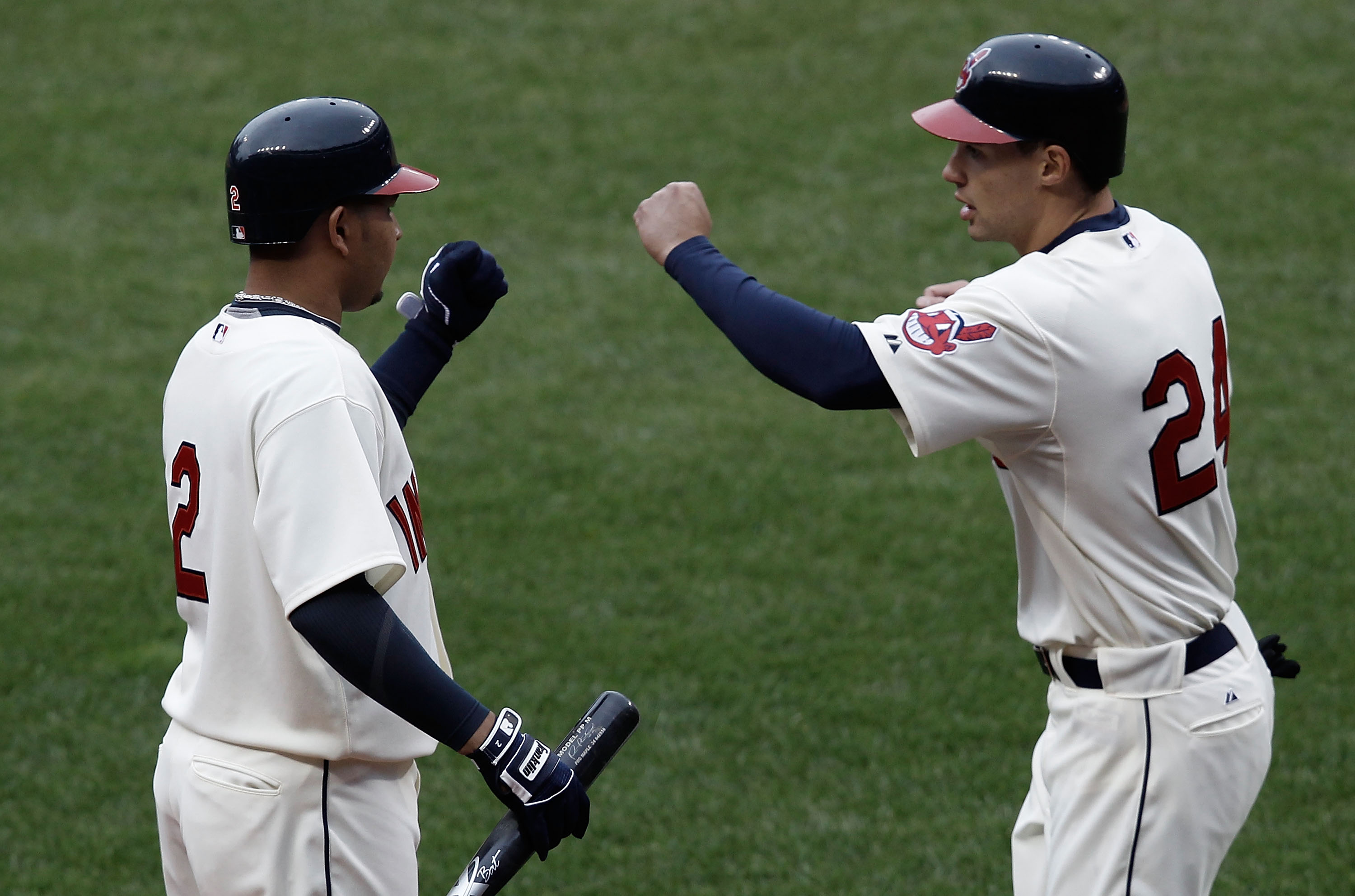 CLEVELAND, OH- APRIL 17: Grady Sizemore #24 is congratulated by teammate Jhonny Peralta #2 of the Cleveland Indians after scoring in the 8th inning against the Chicago White Sox during the game on April 17, 2010 at Progressive Field in Cleveland, Ohio.  (