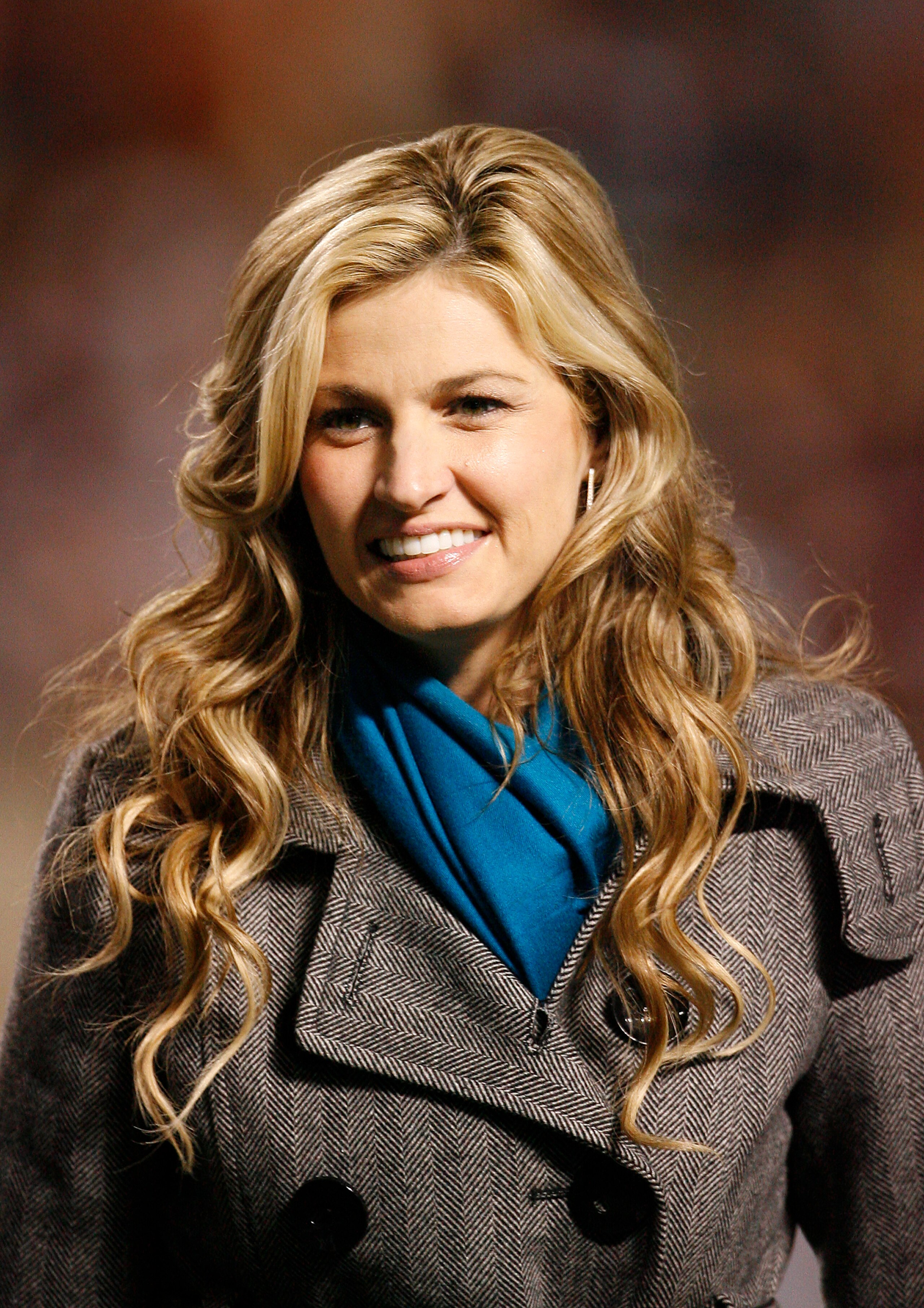 COLLEGE STATION, TX - NOVEMBER 26: Erin Andrews of ESPN smiles as she watches the pregame action prior to the Texas Longhorns against Texas A&M Aggies at Kyle Field on November 26, 2009 in College Station, Texas.  (Photo by Aaron M. Sprecher/Getty Images)