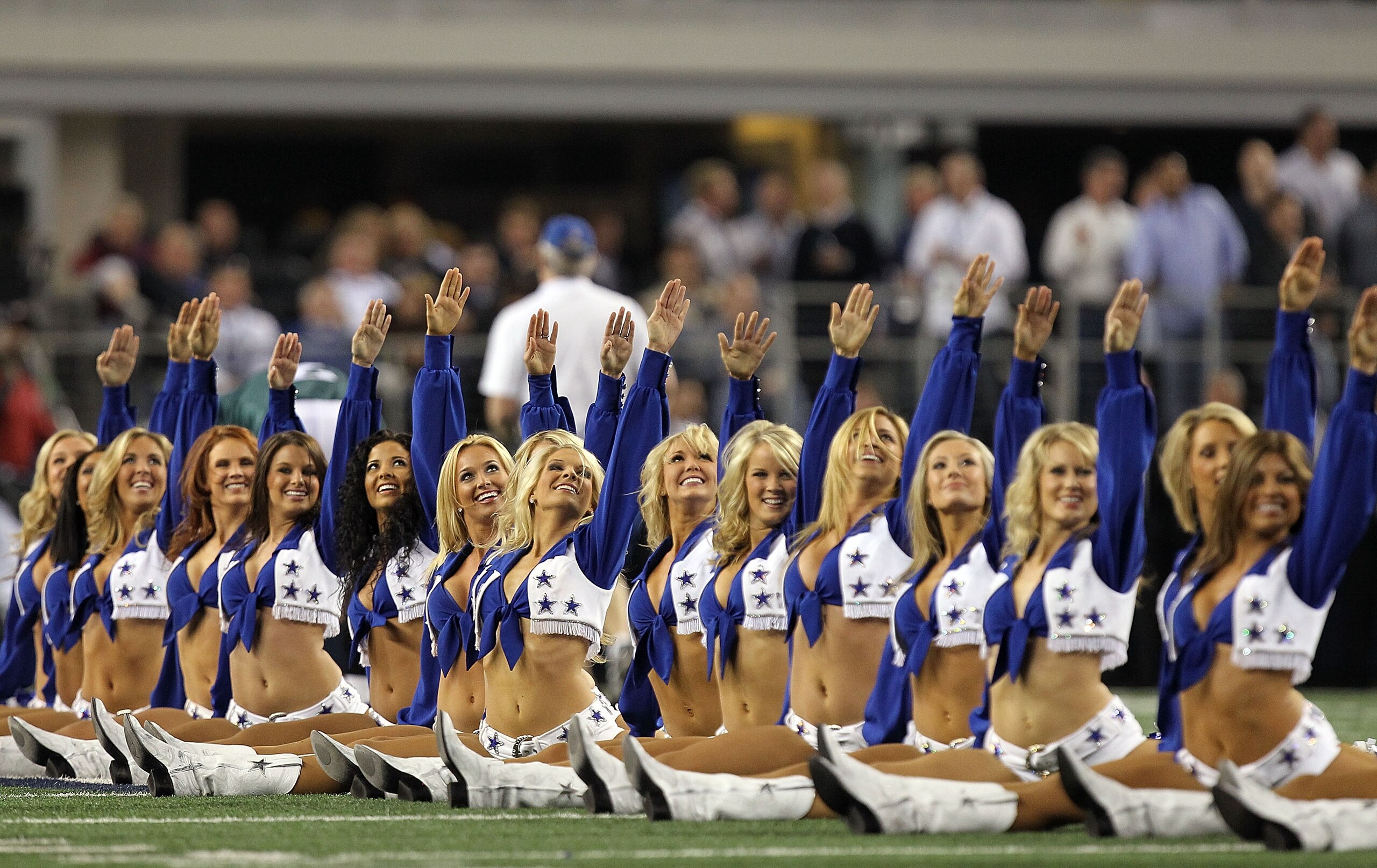 ARLINGTON, TX - DECEMBER 12:  The Dallas Cowboys Cheerleaders perform at Cowboys Stadium on December 12, 2010 in Arlington, Texas.  (Photo by Ronald Martinez/Getty Images)