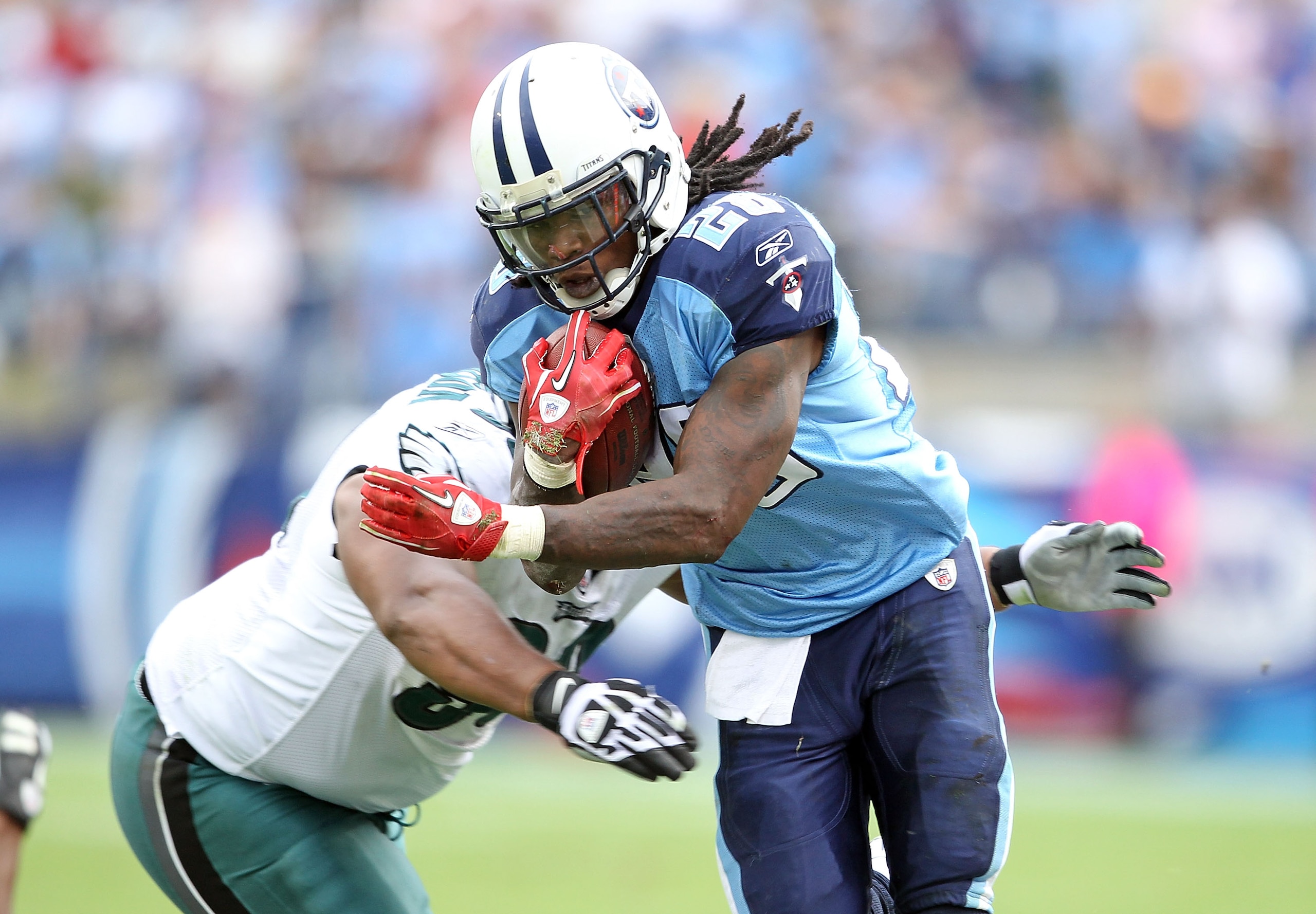 NASHVILLE, TN - OCTOBER 24:  Chris Johnson #28 of the Tennessee Titans runs with the ball during the NFL game against the Philadelphia Eagles at LP Field on October 24, 2010 in Nashville, Tennessee. The Titans won 37-19.  (Photo by Andy Lyons/Getty Images
