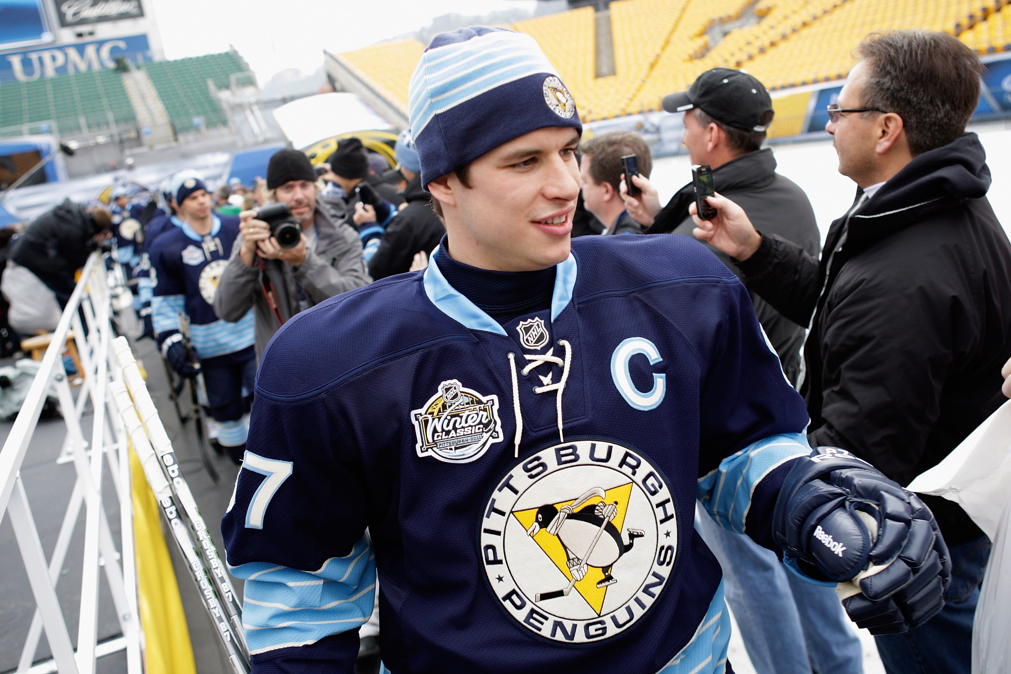PITTSBURGH, PA - DECEMBER 31:  Sidney Crosby #87 of the Pittsburgh Penguins is greeted by fans while walking out to the rink for practice ahead of the 2011 NHL Winter Classic between the Penguins and the Washington Capitals on December 31, 2010 at Heinz F