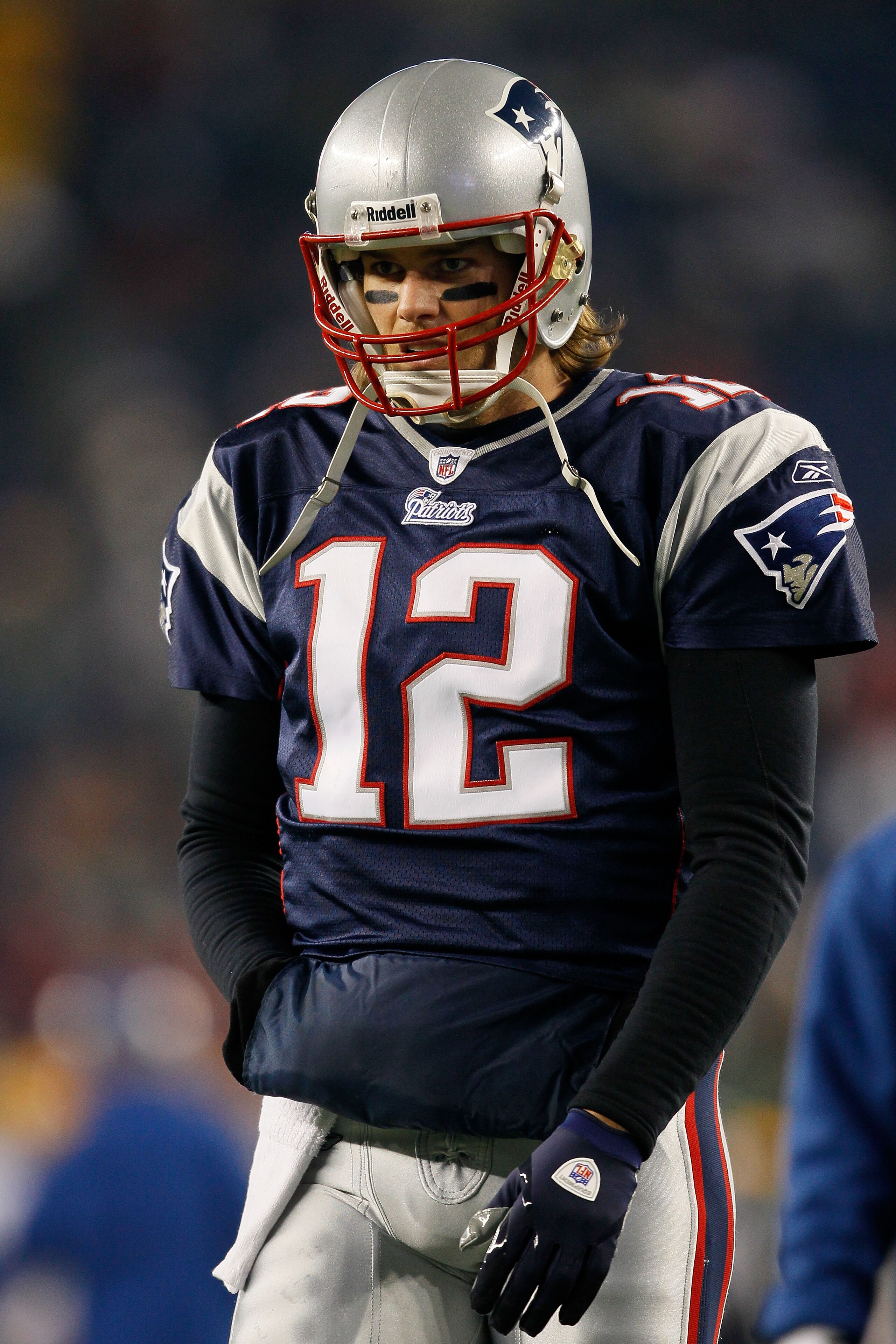 FOXBORO, MA - DECEMBER 19:  Quarterback Tom Brady #12 of the New England Patriots looks on before the game against the Green Bay Packers at Gillette Stadium on December 19, 2010 in Foxboro, Massachusetts. The Patriots won the game 31-27.  (Photo by Jim Ro