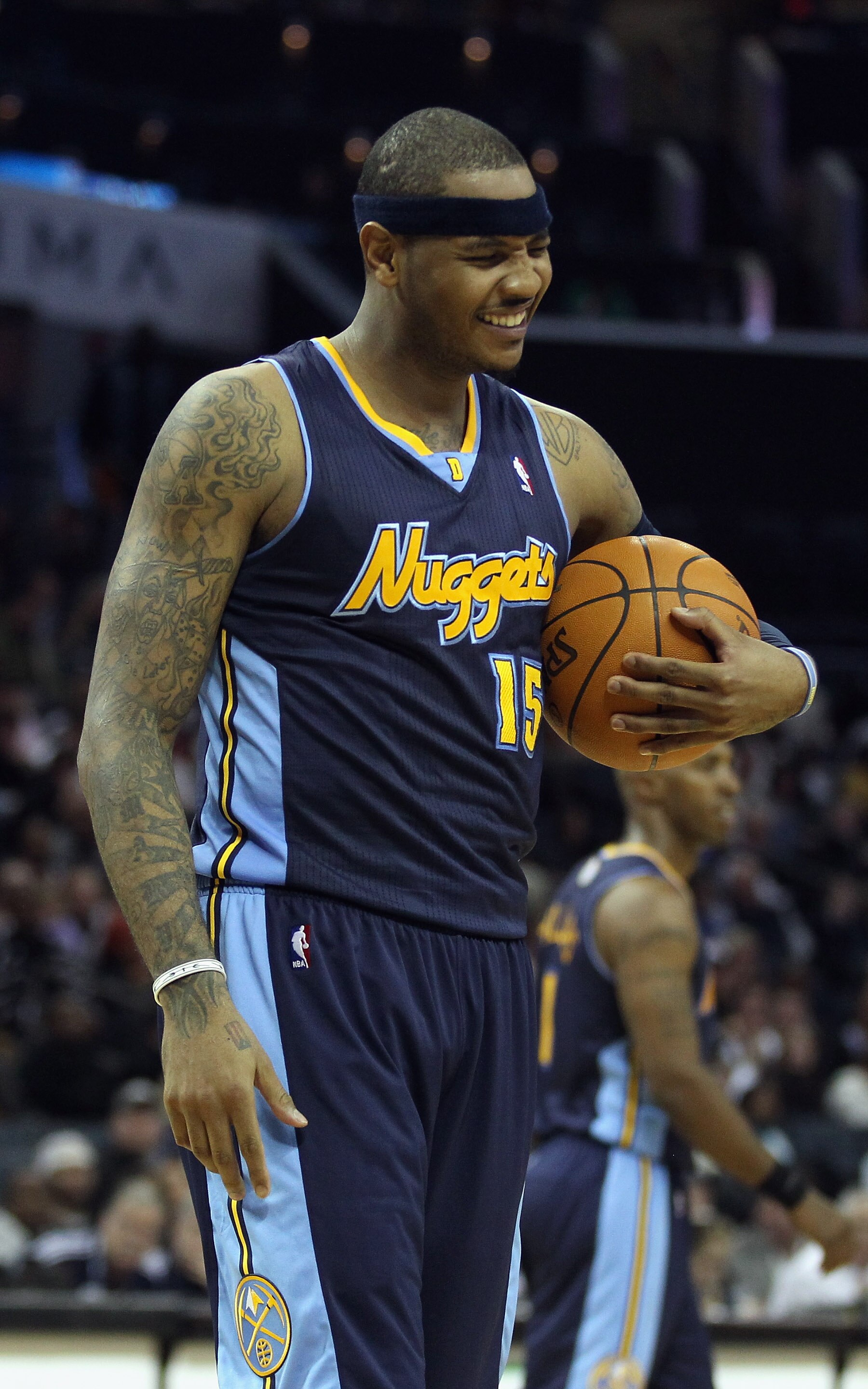 CHARLOTTE, NC - DECEMBER 07:  Carmelo Anthony #15 of the Denver Nuggets watches on against the Charlotte Bobcats during their game at Time Warner Cable Arena on December 7, 2010 in Charlotte, North Carolina.  NOTE TO USER: User expressly acknowledges and