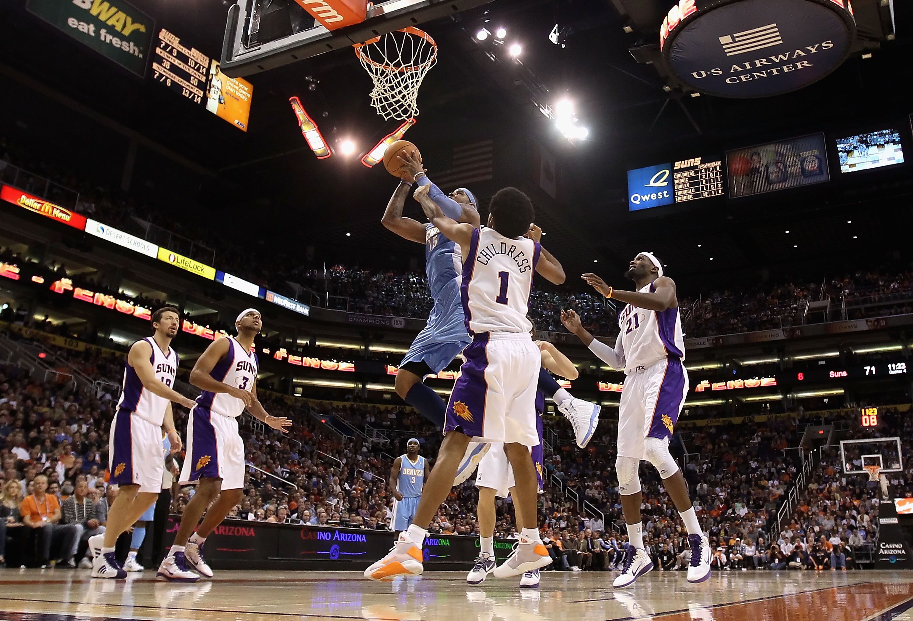 PHOENIX - NOVEMBER 15:  Carmelo Anthony #15 of the Denver Nuggets puts up a shot during the NBA game against the Phoenix Suns at US Airways Center on November 15, 2010 in Phoenix, Arizona.  The Suns defeated the Nuggets 100-94.  NOTE TO USER: User express