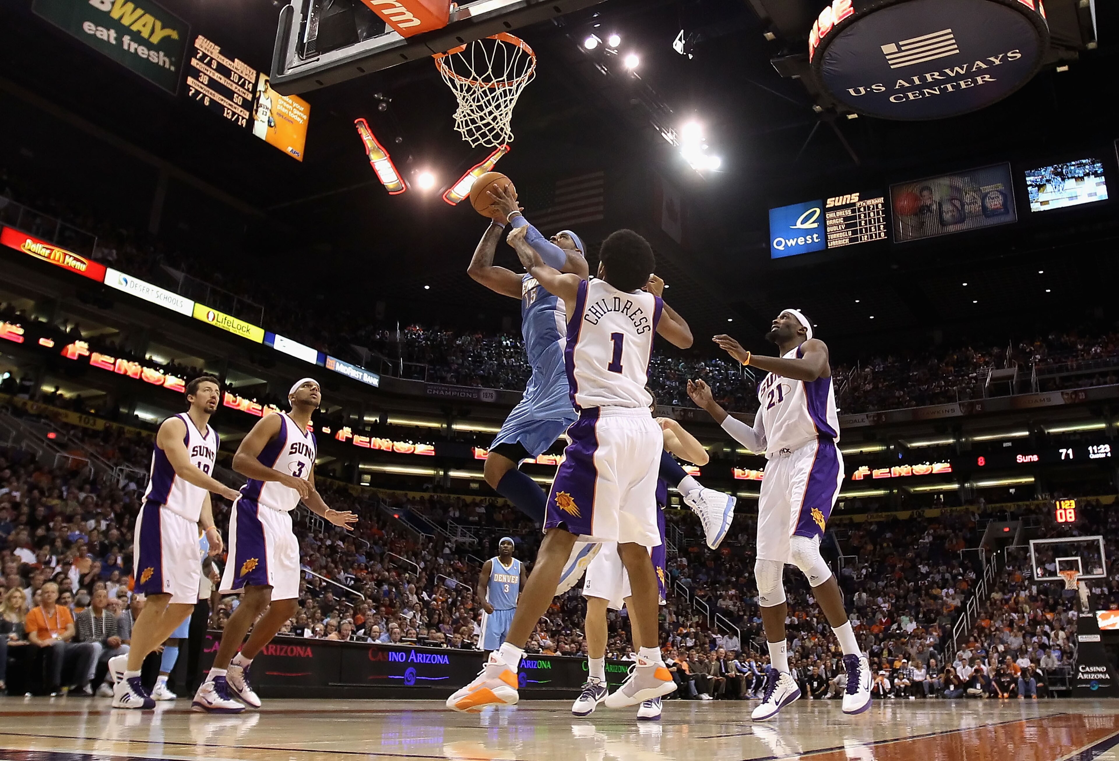 PHOENIX - NOVEMBER 15:  Carmelo Anthony #15 of the Denver Nuggets puts up a shot during the NBA game against the Phoenix Suns at US Airways Center on November 15, 2010 in Phoenix, Arizona.  The Suns defeated the Nuggets 100-94.  NOTE TO USER: User express
