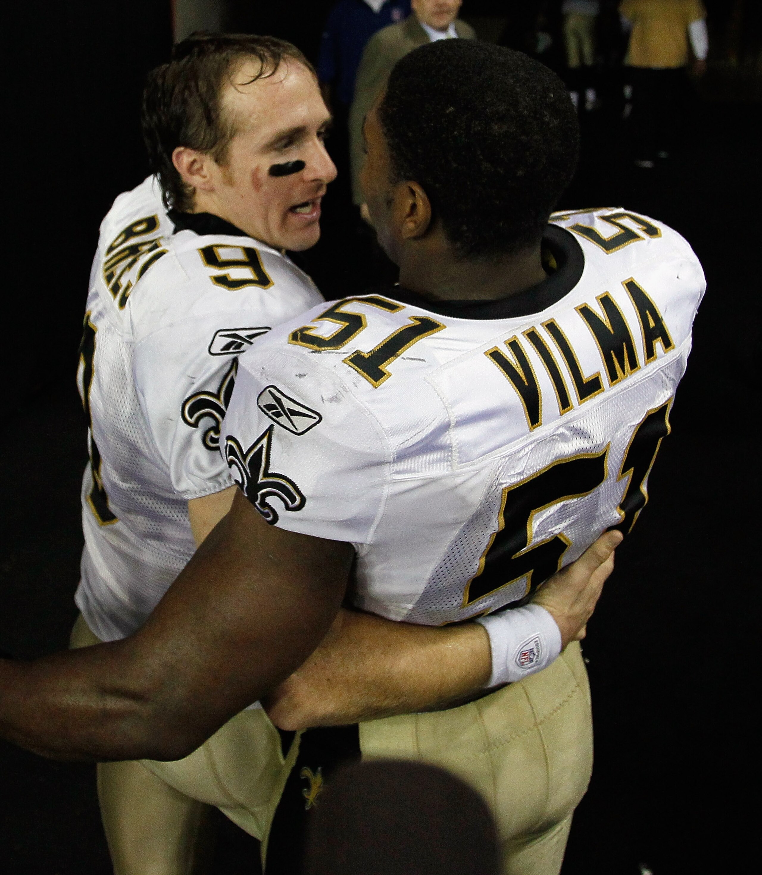 ATLANTA, GA - DECEMBER 27: Quarterback Drew Brees #9 of the New Orleans Saints celebrates with Jonathan Vilma #51 after defeating the Atlanta Falcons 17-14 at the Georgia Dome on December 27, 2010 in Atlanta, Georgia. (Photo by Kevin C. Cox/Getty Images ATLANTA, GA - DECEMBER 27: Quarterback Drew Brees #9 of the New Orleans Saints celebrates with Jonathan Vilma #51 after defeating the Atlanta Falcons 17-14 at the Georgia Dome on December 27, 2010 in Atlanta, Georgia. (Photo by Kevin C. Cox/Getty Images