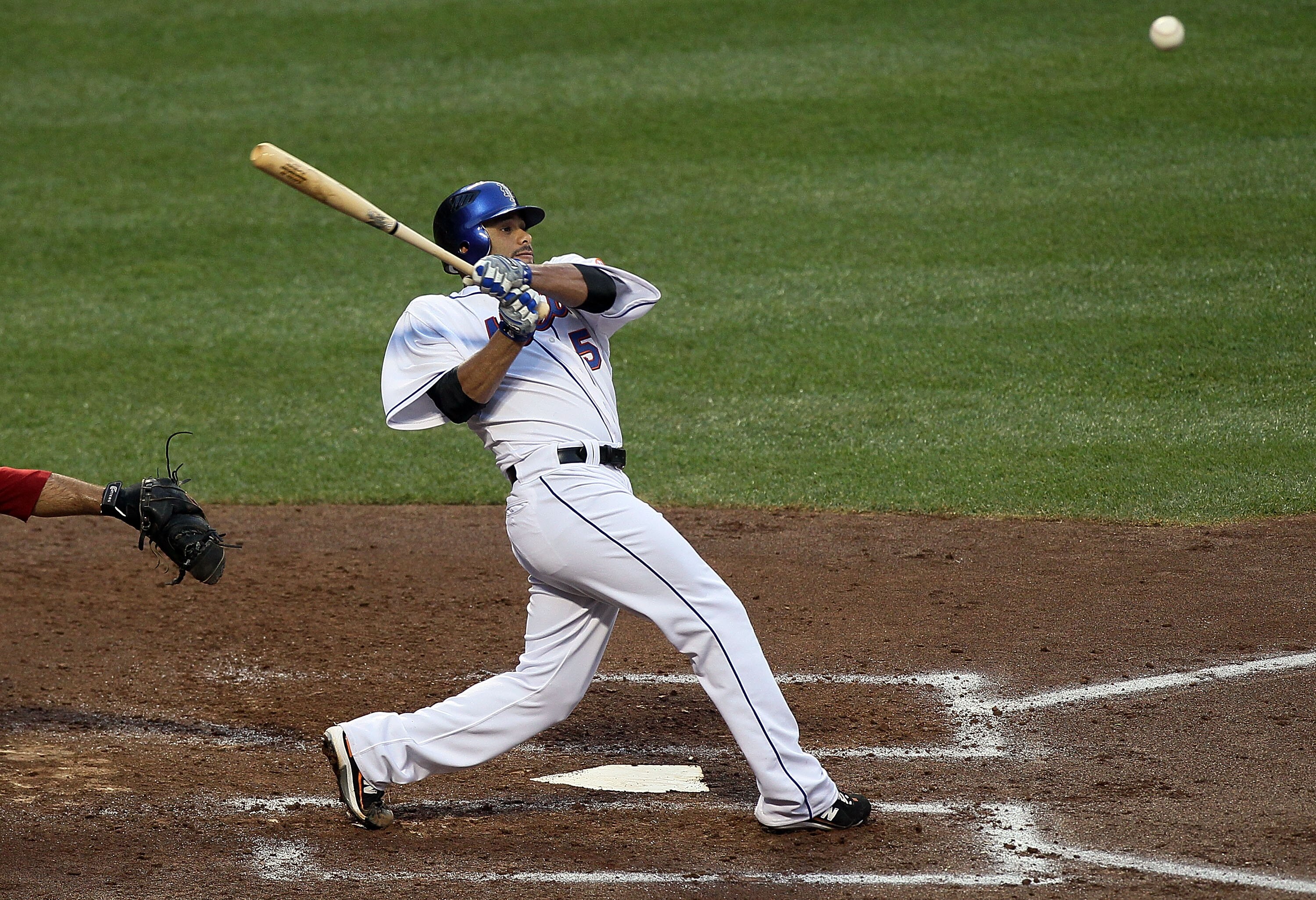 NEW YORK - JULY 06:  Johan Santana #57 of the New York Mets bats against the Cincinnati Reds on July 6, 2010 at Citi Field in the Flushing neighborhood of the Queens borough of New York City.  (Photo by Jim McIsaac/Getty Images)