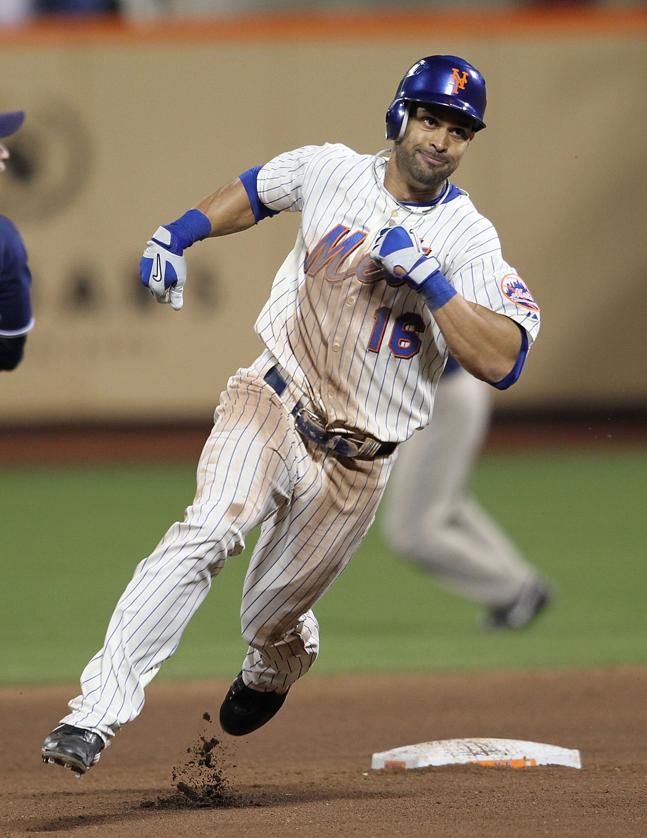 NEW YORK - JUNE 08: Angel Pagan #16 of the New York Mets runs the bases on a triple in the tenth inning against the San Diego Padres on June 8, 2010 in the Flushing neighborhood of the Queens borough of New York City. (Photo by Nick Laham/Getty Images) NEW YORK - JUNE 08: Angel Pagan #16 of the New York Mets runs the bases on a triple in the tenth inning against the San Diego Padres on June 8, 2010 in the Flushing neighborhood of the Queens borough of New York City. (Photo by Nick Laham/Getty Images)