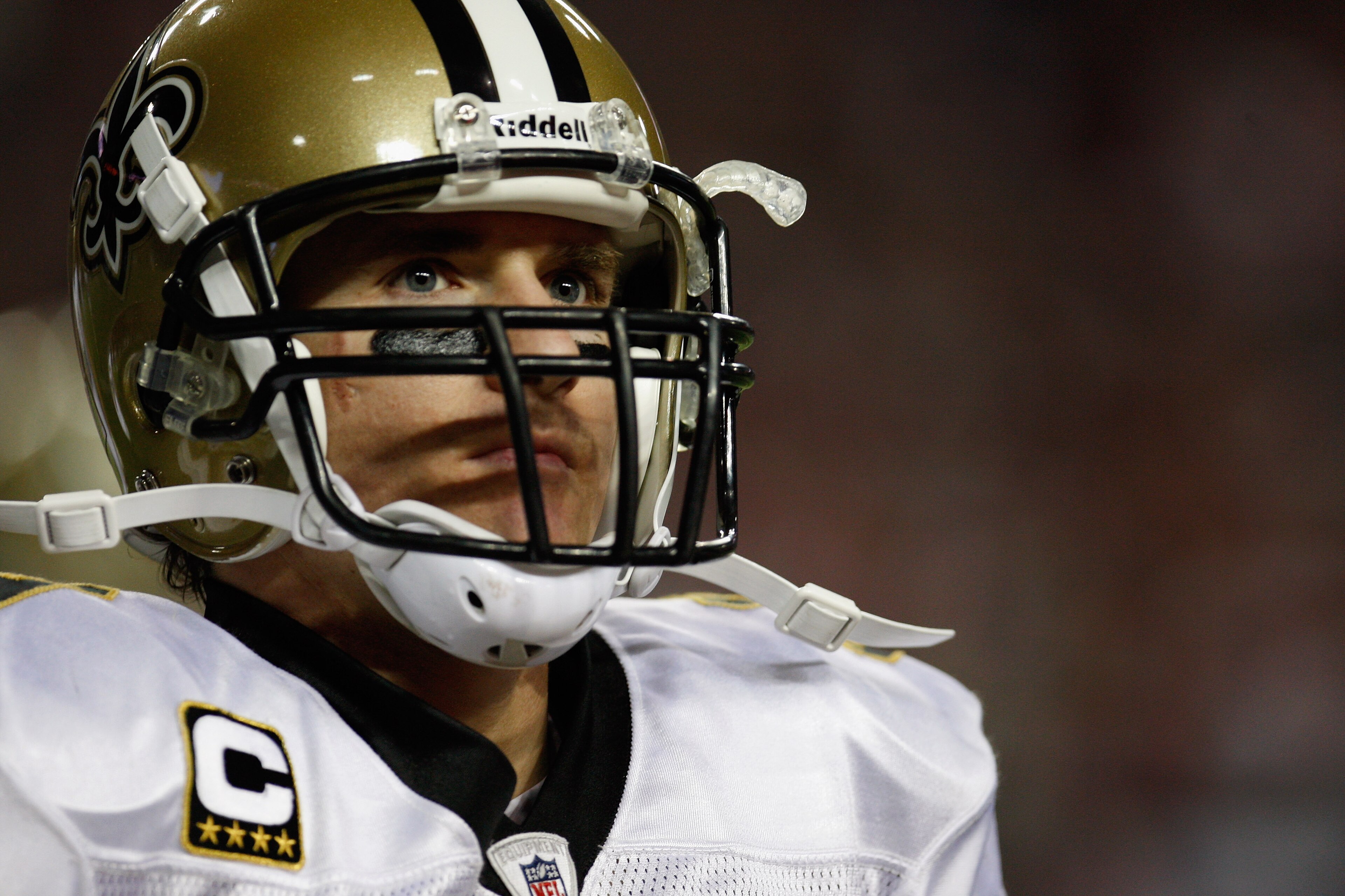ATLANTA, GA - DECEMBER 27:  Quarterback Drew Brees #9 of the New Orleans Saints walks off the field in the second half during the game against the Atlanta Falcons at the Georgia Dome on December 27, 2010 in Atlanta, Georgia.  (Photo by Scott Halleran/Gett