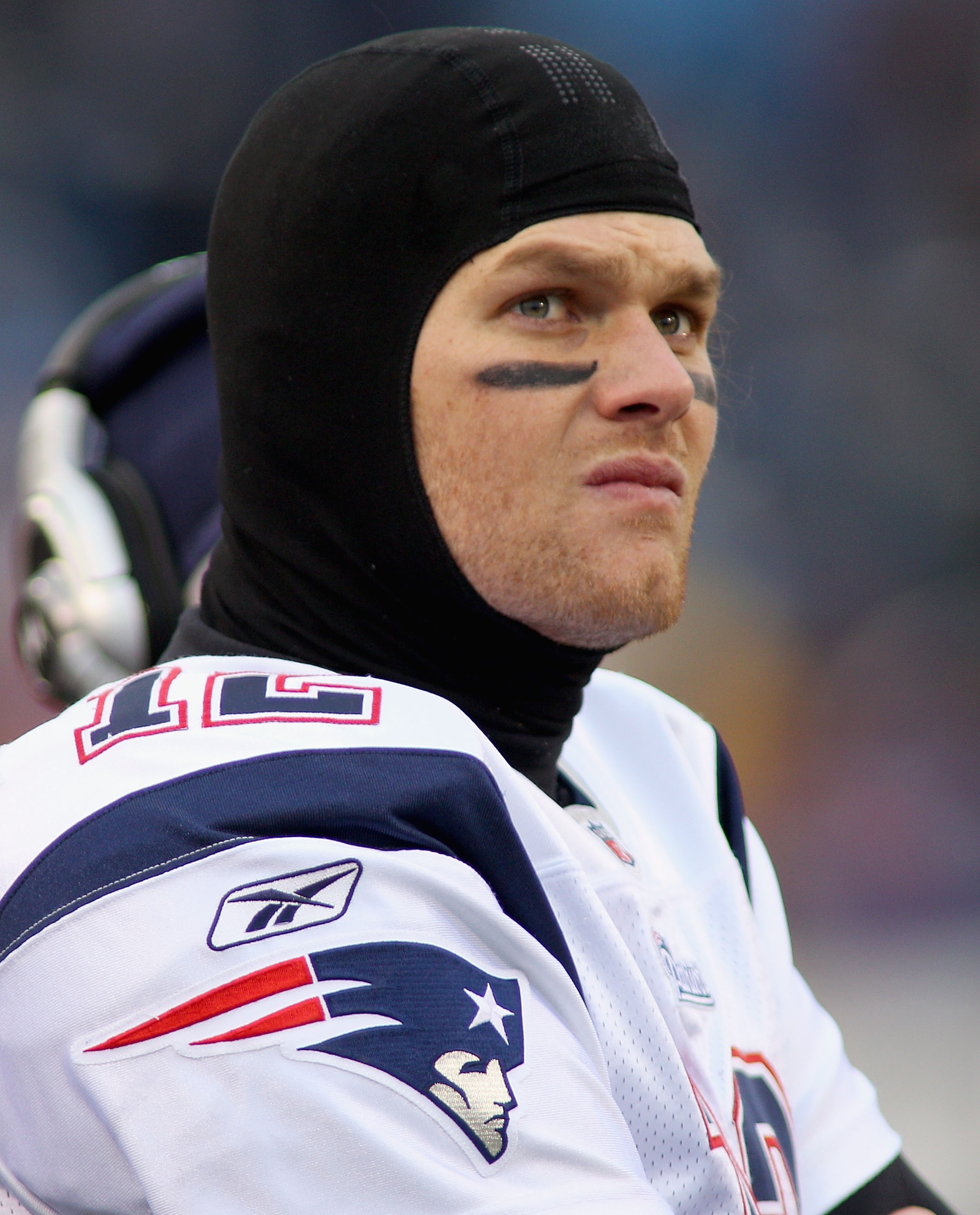ORCHARD PARK, NY - DECEMBER 26:  Tom Brady #12 of the New England Patriots stands on the sidelines  against the Buffalo Bills  at Ralph Wilson Stadium on December 26, 2010 in Orchard Park, New York.  New England won 34-3.  (Photo by Rick Stewart/Getty Ima
