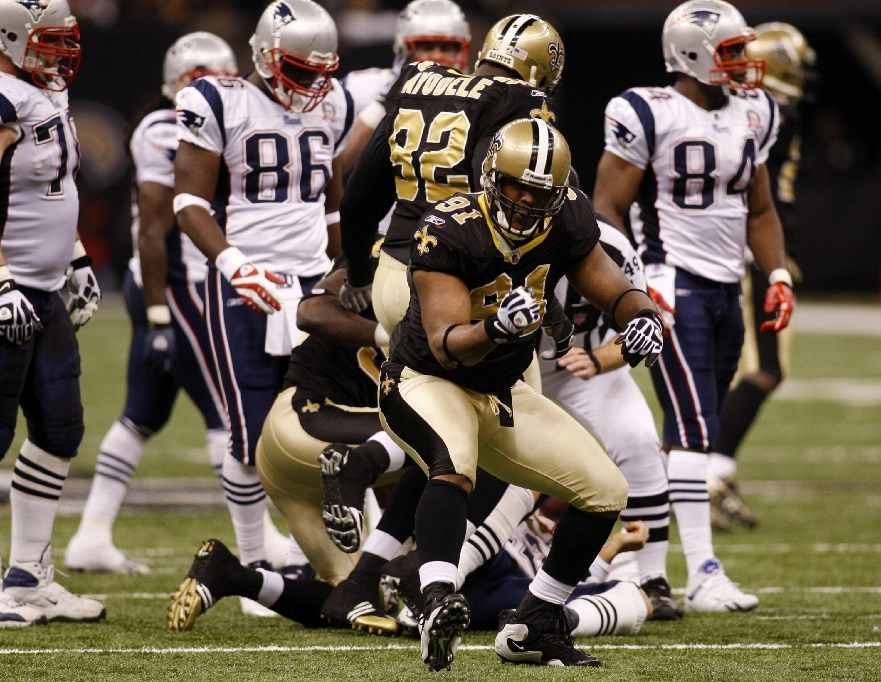NEW ORLEANS - NOVEMBER 30: Will Smith #91 of the New Orleans Saints celebrates after sacking Tom Brady #12 of the New England Patriots during the  game at Louisana Superdome on November 30, 2009 in New Orleans, Louisiana. (Photo by Scott Halleran/Getty Im