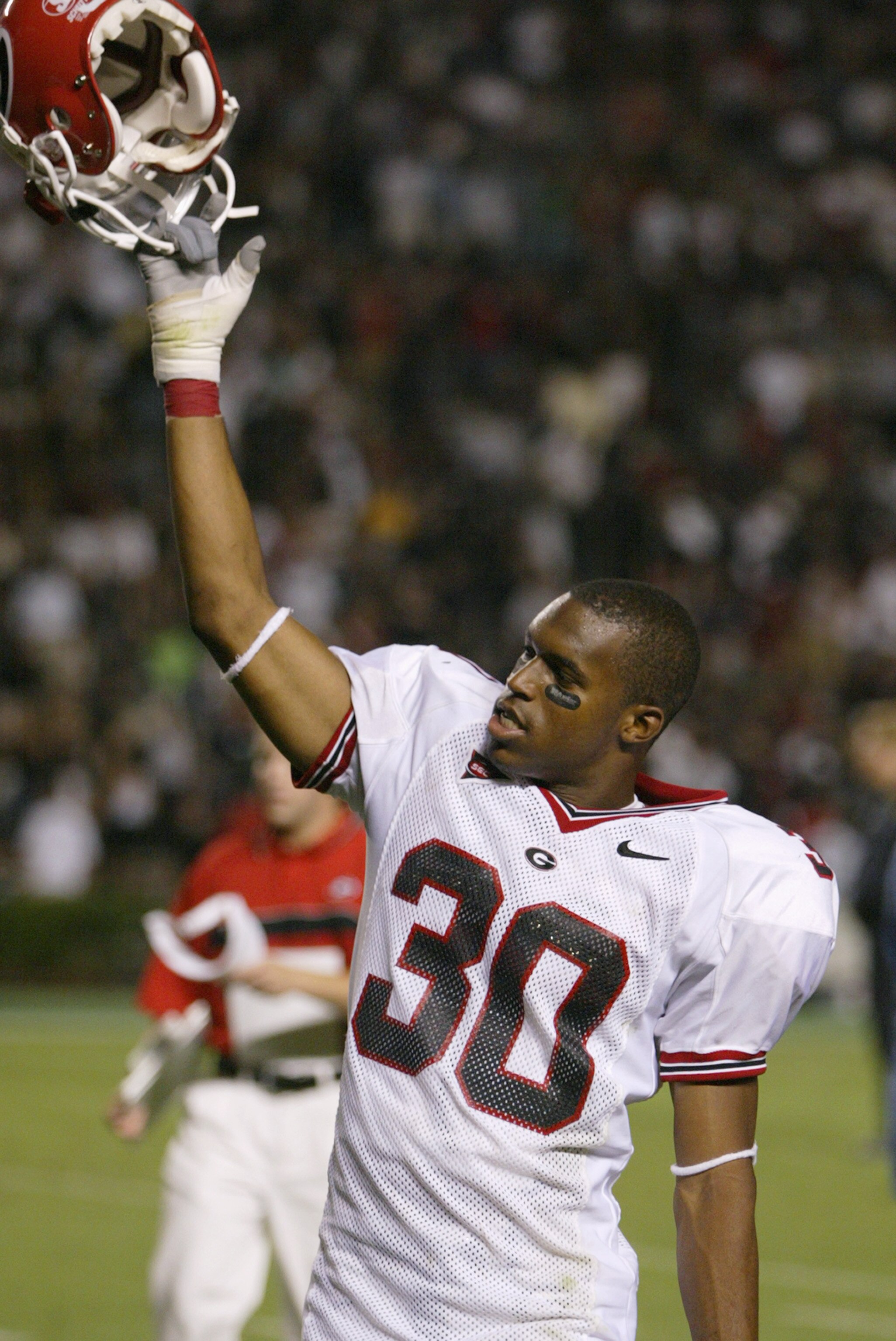COLUMBIA, SC - SEPTEMBER 11:  Defensive back Kelin Johnson #30 of the Georgia Bulldogs celebrates after facing the South Carolina Gamecocks during their game at Williams-Brice Stadium on September 11, 2004 in Columbia, South Carolina. Georgia defeated Sou