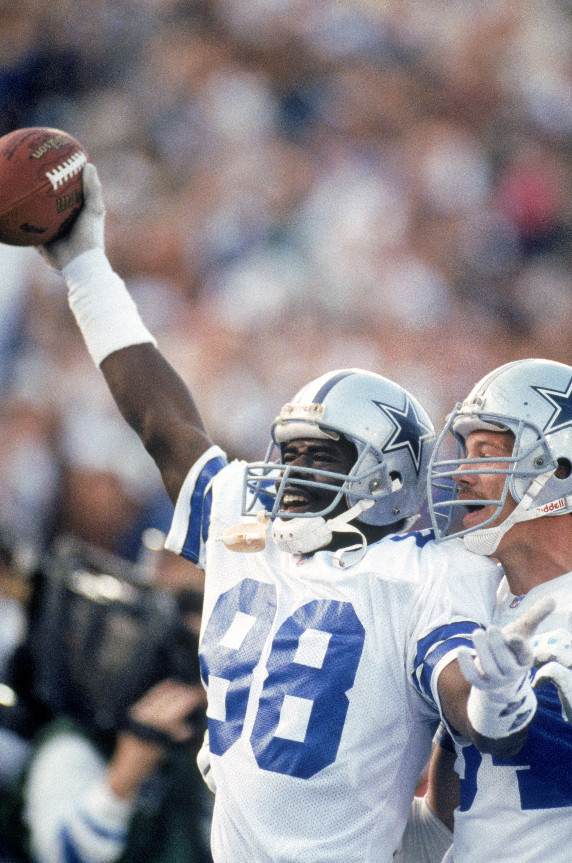 PASADENA, CA - JANUARY 31:  Wide receiver Michael Irvin #88 of the Dallas Cowboys celebrates in the end zone after a eighteen yards touchdown reception his second of the game during Super Bowl XXVII against the Buffalo Bills at the Rose Bowl on January 31