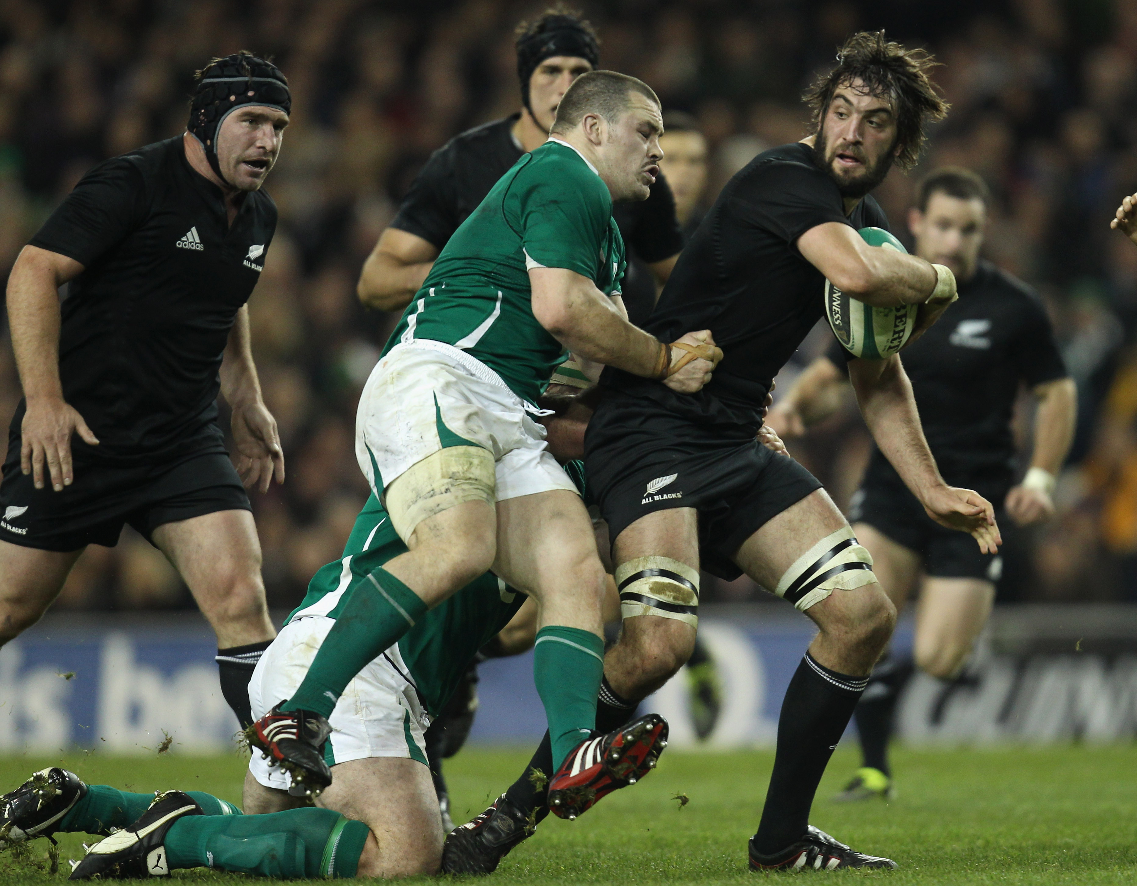 DUBLIN, IRELAND - NOVEMBER 20:  Sam Whitelock of the All Blacks is tackled by Cian Healy of Ireland during the Test match between Ireland and the New Zealand All Blacks at Aviva Stadium on November 20, 2010 in Dublin, Ireland.  (Photo by Phil Walter/Getty