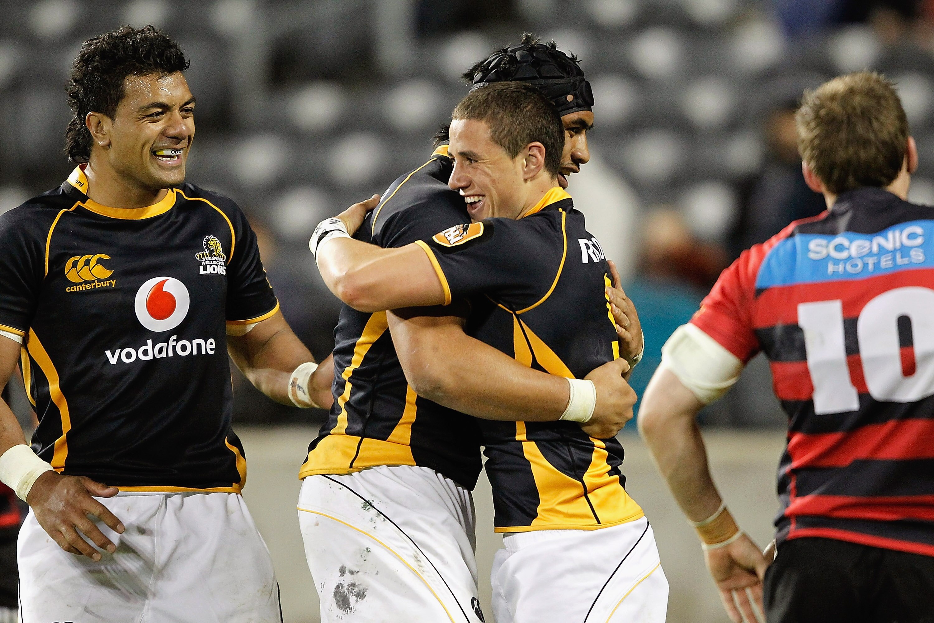 CHRISTCHURCH, NEW ZEALAND - OCTOBER 29: TJ Perenara of Wellington receives a hug from teammate Victor Vito after scoring a try during the ITM Cup Semi Final match between Canterbury and Wellington at AMI Stadium on October 29, 2010 in Christchurch, New Ze