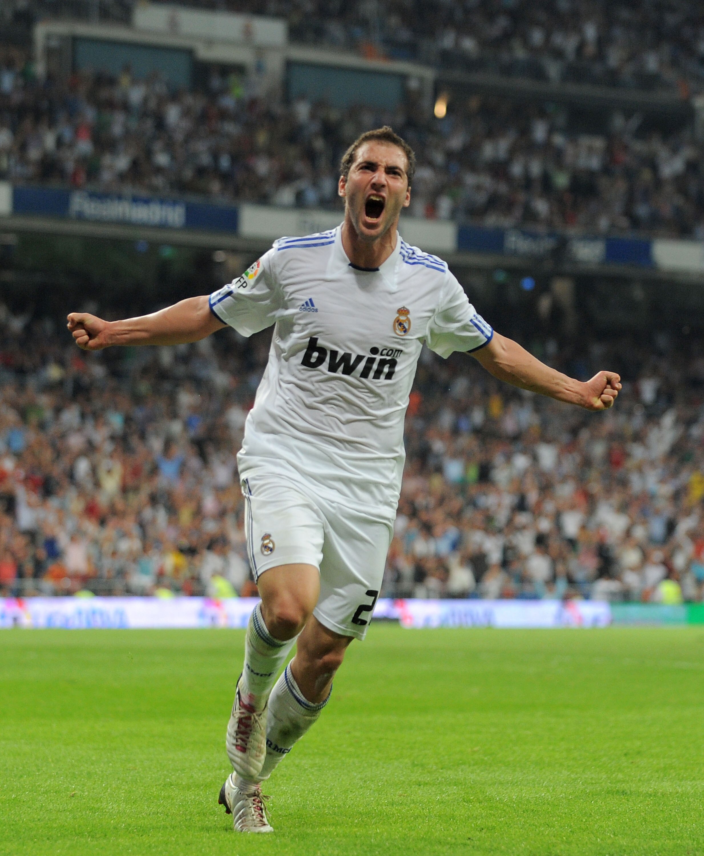 MADRID, SPAIN - SEPTEMBER 21:  Gonzalo Higuain  of Real Madrid celebrates scoring Real's second goal during the La Liga match between Real Madrid and Espanyol at Estadio Santiago Bernabeu on September 21, 2010 in Madrid, Spain.  (Photo by Denis Doyle/Gett