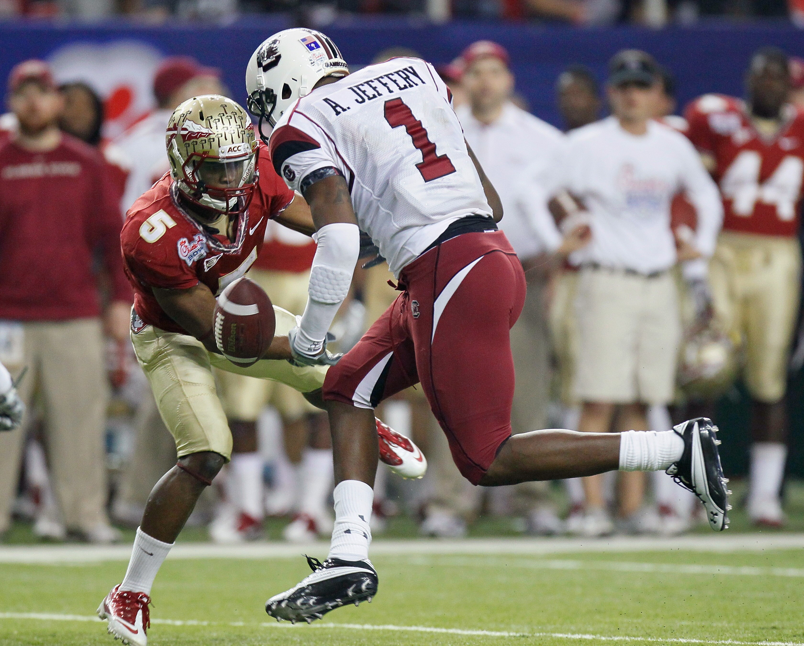 ATLANTA, GA - DECEMBER 31:  Greg Reid #5 of the Florida State Seminoles breaks up a pass intended for Alshon Jeffery #1 of the South Carolina Gamecocks during the 2010 Chick-fil-A Bowl at Georgia Dome on December 31, 2010 in Atlanta, Georgia.  (Photo by K