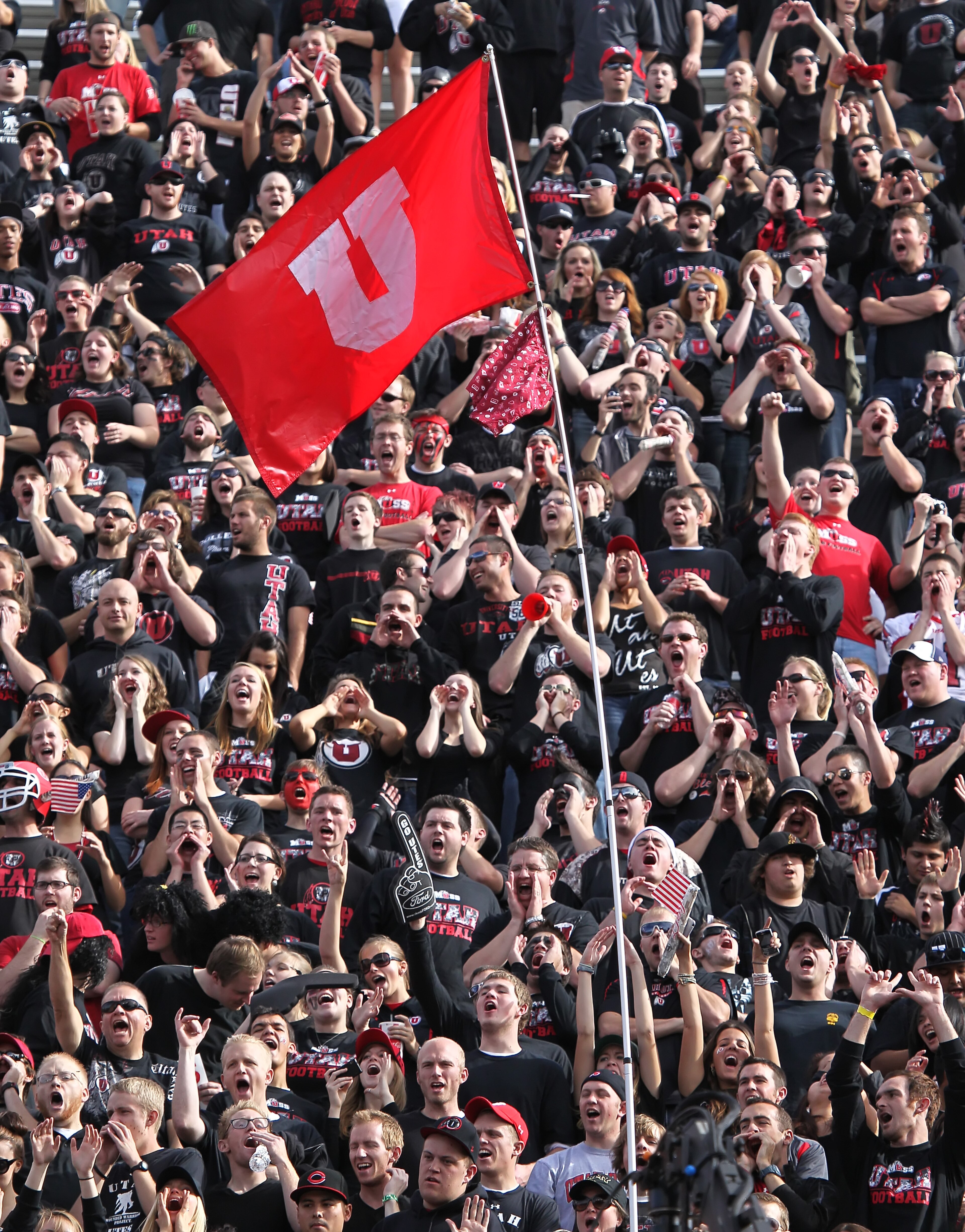 SALT LAKE CITY, UT - NOVEMBER 6: Fans of the Utah Utes cheer during a game against the TCU Horned Frogs during the first half of an NCAA Football game November 6, 2010 at Rice-Eccles Stadium in Salt Lake City, Utah. TCU Beat Utah 47-7. (Photo by George F SALT LAKE CITY, UT - NOVEMBER 6: Fans of the Utah Utes cheer during a game against the TCU Horned Frogs during the first half of an NCAA Football game November 6, 2010 at Rice-Eccles Stadium in Salt Lake City, Utah. TCU Beat Utah 47-7. (Photo by George F