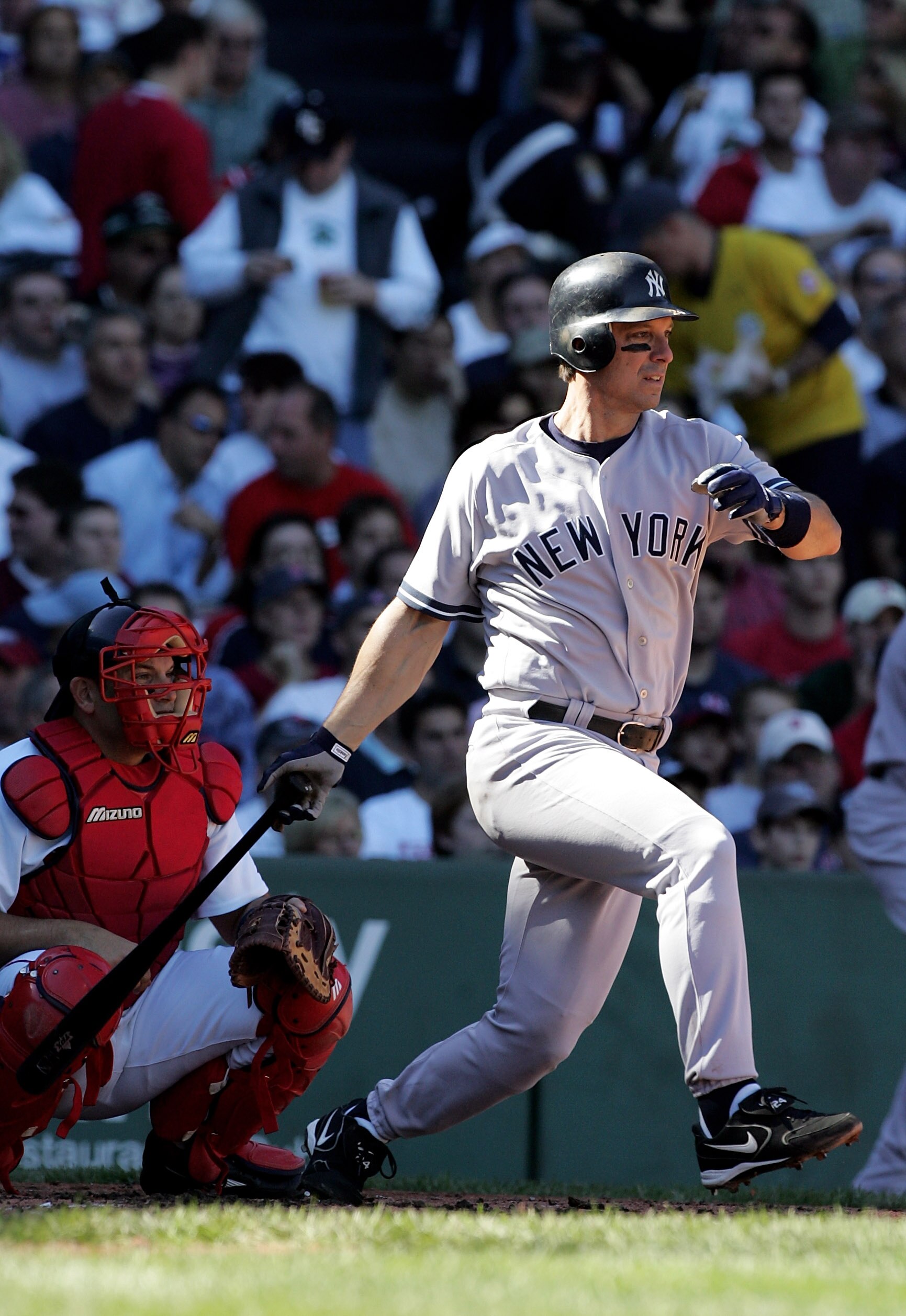 BOSTON - OCTOBER 01:  Tino Martinez #24 of the New York Yankees hits a base hit to lead off the second inning against the Boston Red Sox at Fenway Park on October 1, 2005 in Boston, Massachusetts.  (Photo by Jim McIsaac/Getty Images)