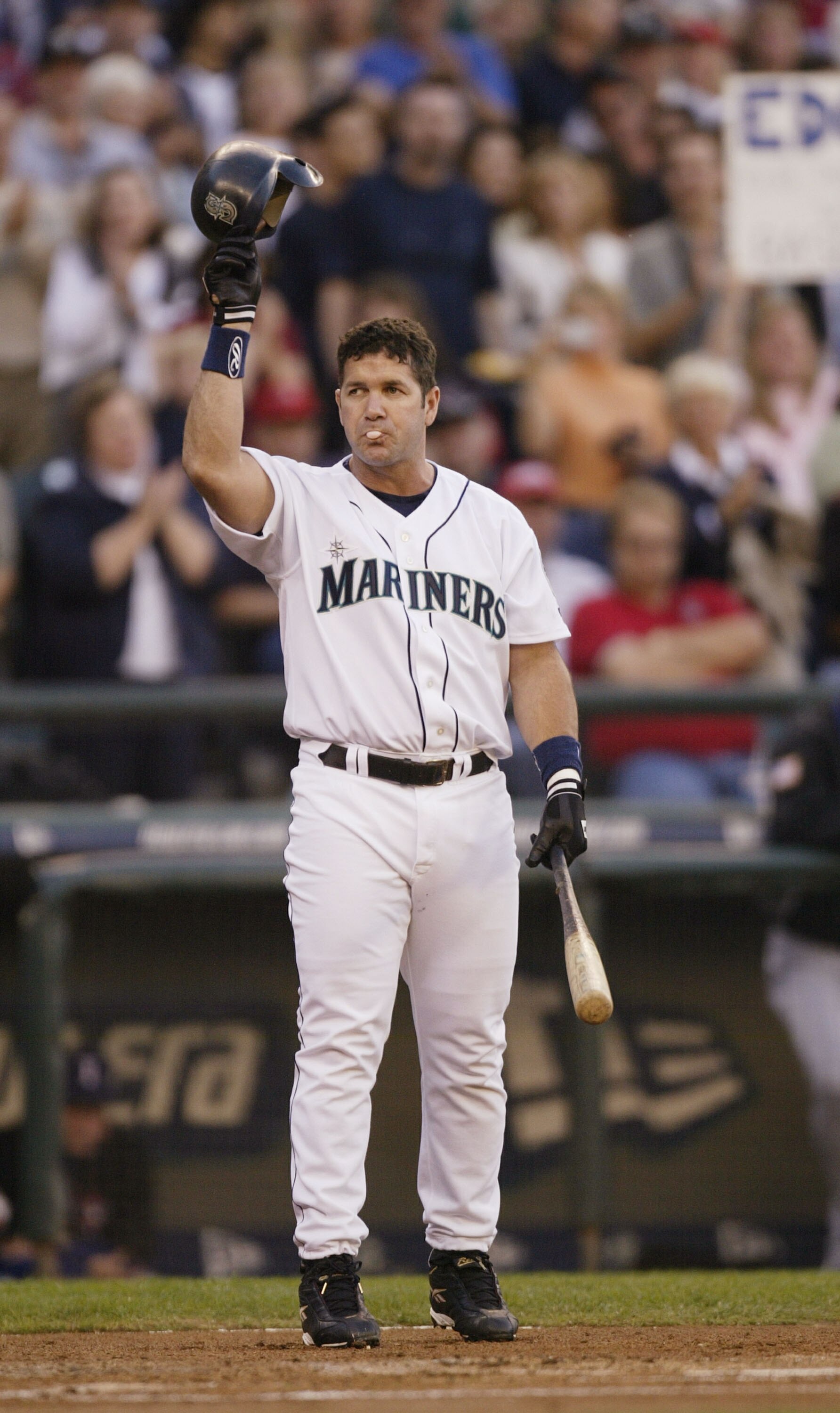 SEATTLE - OCTOBER 2:  Edgar Martinez #11 of the Seattle Mariners receives an ovation from the fans as he comes to bat in the first inning against the Texas Rangers in the  inning on October 2, 2004 at Safeco Field in Seattle, Washington.  (Photo by Otto G
