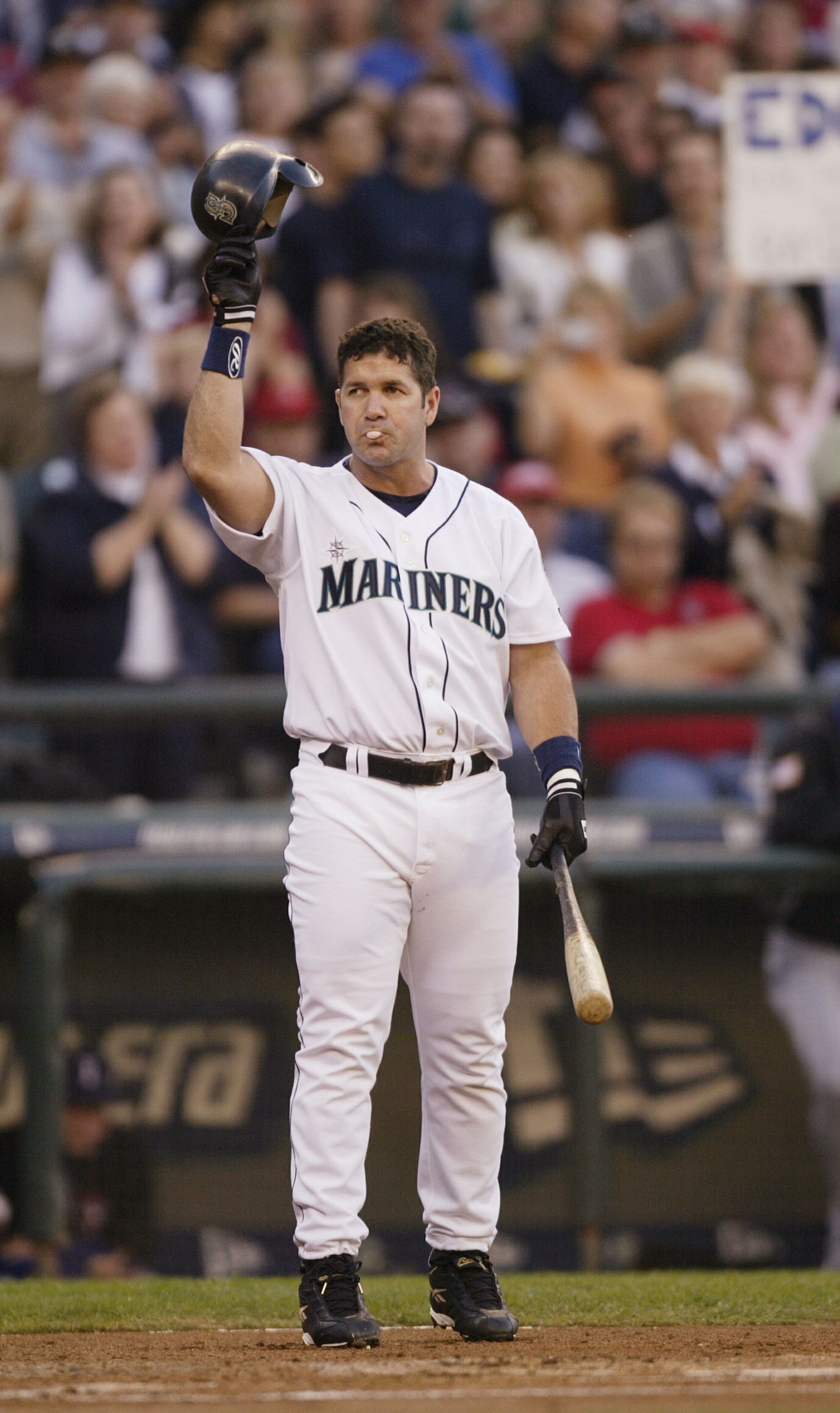 SEATTLE - OCTOBER 2:  Edgar Martinez #11 of the Seattle Mariners receives an ovation from the fans as he comes to bat in the first inning against the Texas Rangers in the  inning on October 2, 2004 at Safeco Field in Seattle, Washington.  (Photo by Otto G