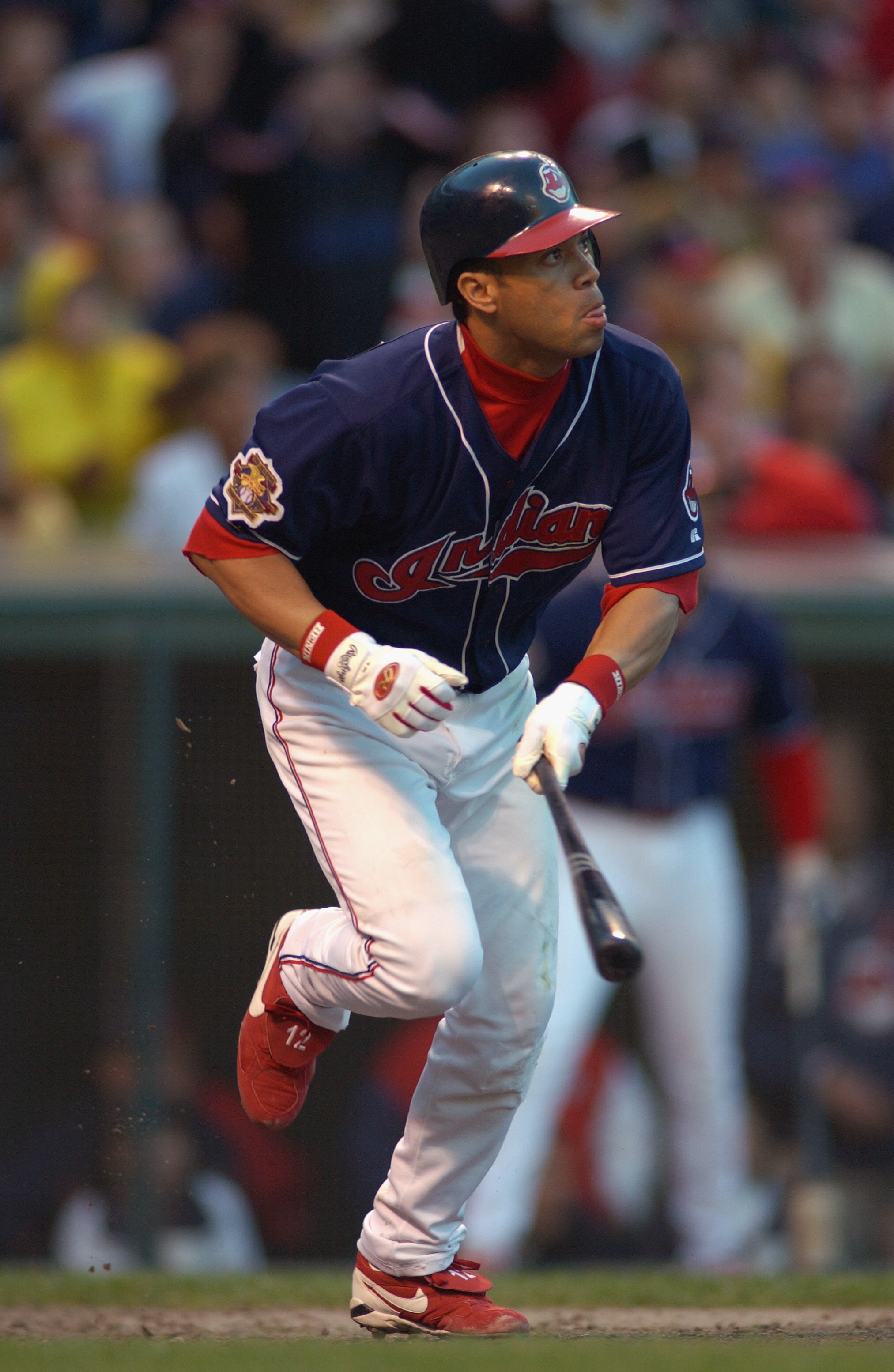 CLEVELAND - OCTOBER 14:  Roberto Alomar #12 of the Cleveland Indians hits a ball deep during Game four of the American League Division Series against the Seattle Mariners on October 14, 2001 at Jacobs Field in Cleveland, Ohio. The Mariners won 6-2.  (Phot