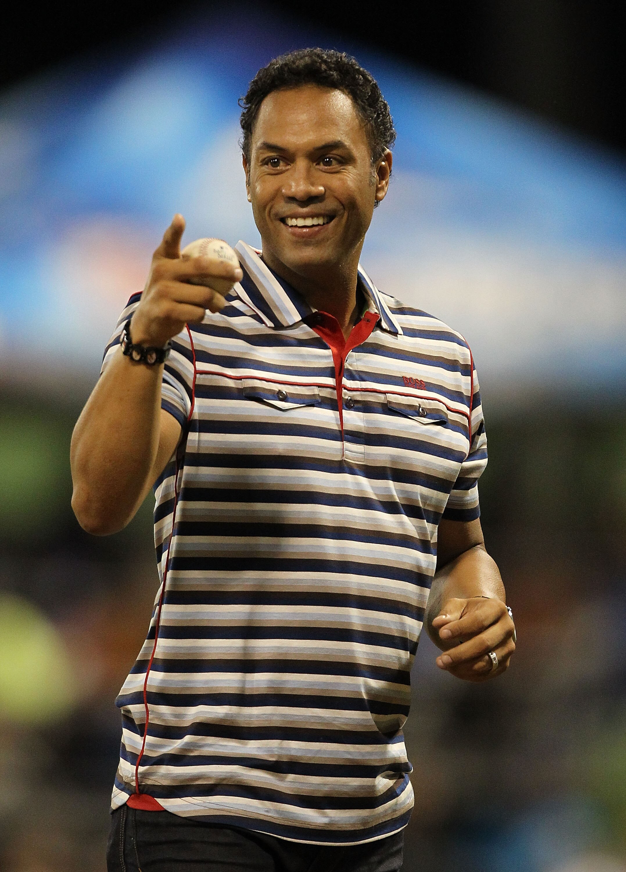 SAN JUAN, PUERTO RICO - JUNE 30:  Roberto Alomar Jr. throws out the first pitch before the game between the New York Mets and the Florida Marlins  during their game at Hiram Bithorn Stadium on June 30, 2010 in San Juan, Puerto Rico.  (Photo by Al Bello/Ge