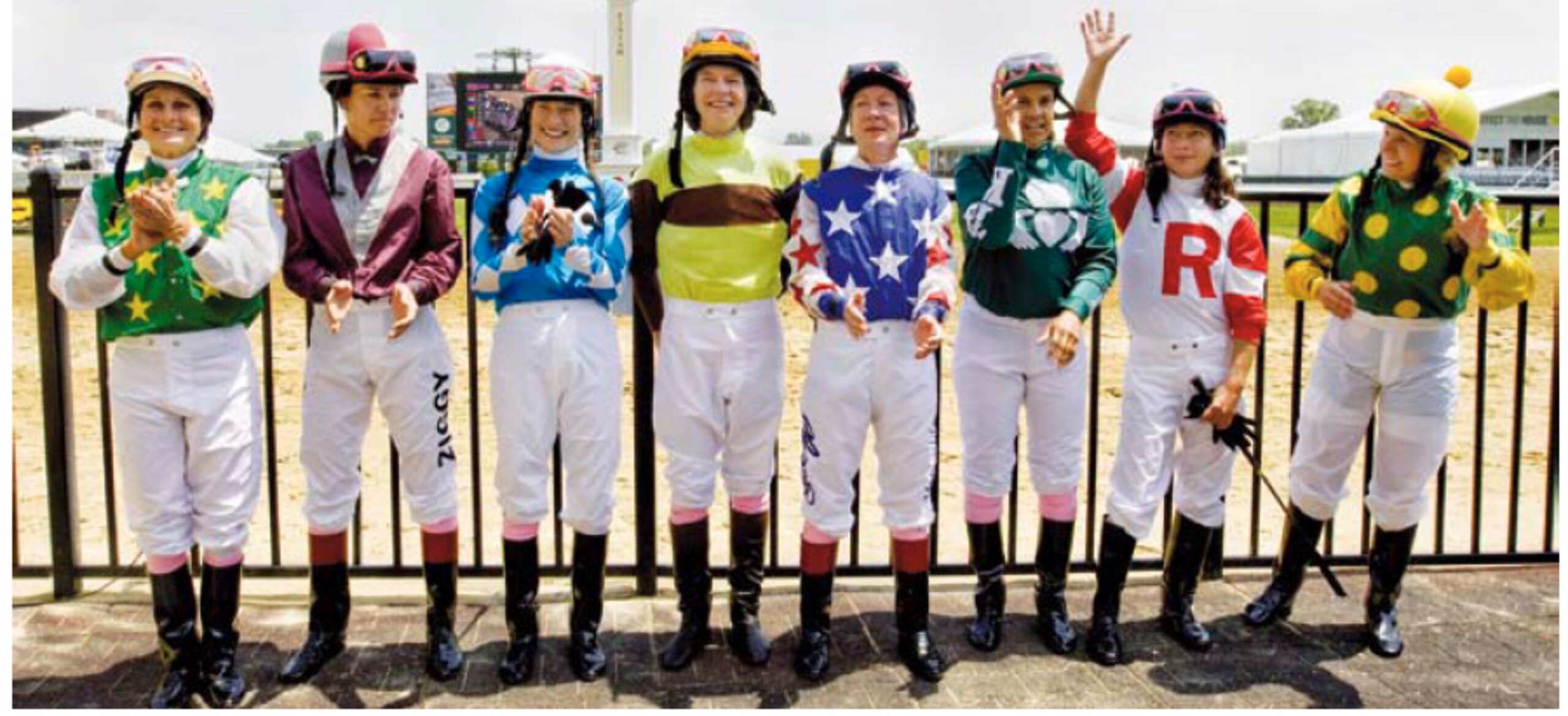 Wagner (red, white, and blue) and seven other female legends before a special race to fight breast cancer