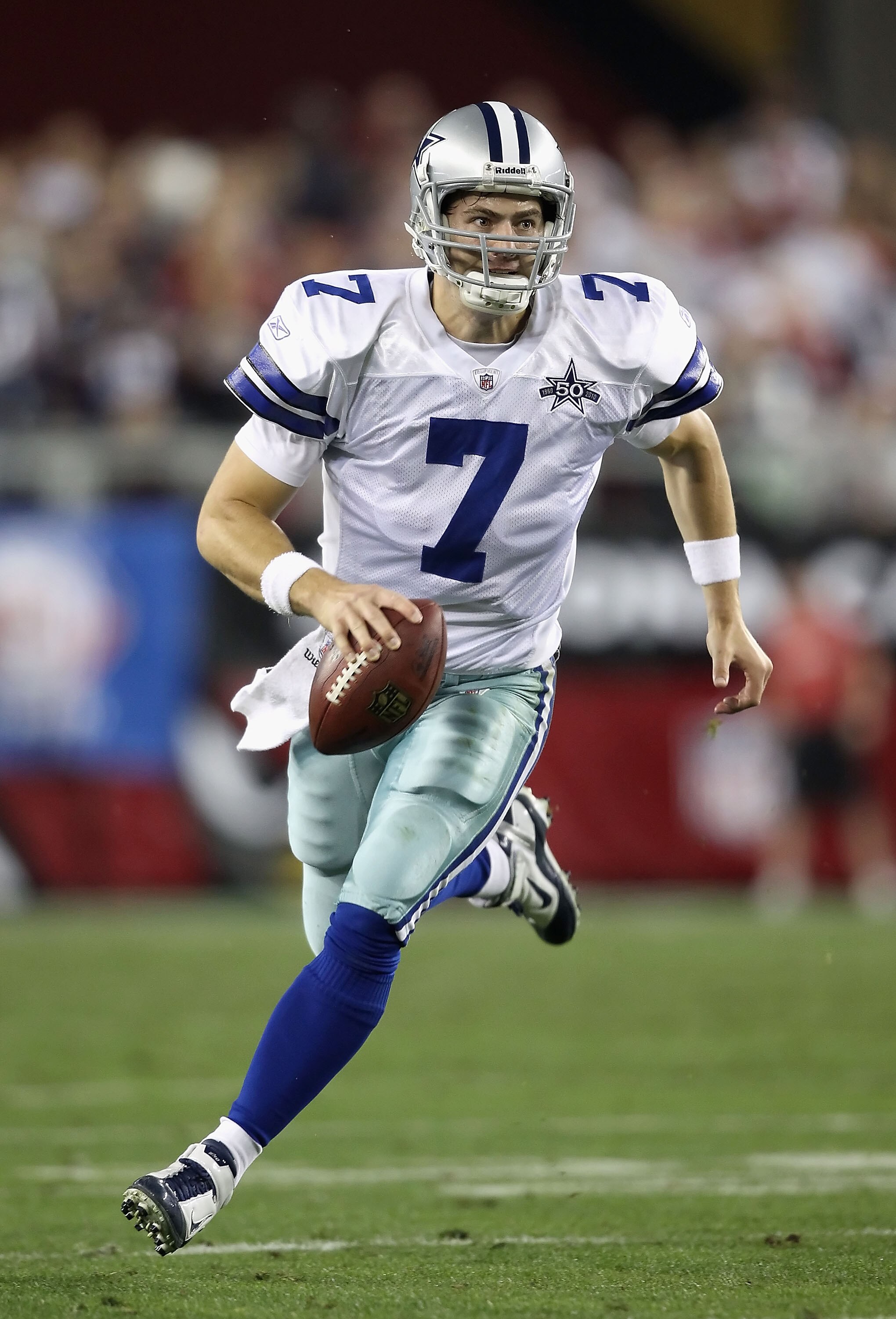 GLENDALE, AZ - DECEMBER 25:  Quarterback Stephen McGee #7 of the Dallas Cowboys scrambles with the football during the NFL game against the Arizona Cardinals at the University of Phoenix Stadium on December 25, 2010 in Glendale, Arizona.  The Cardinals de