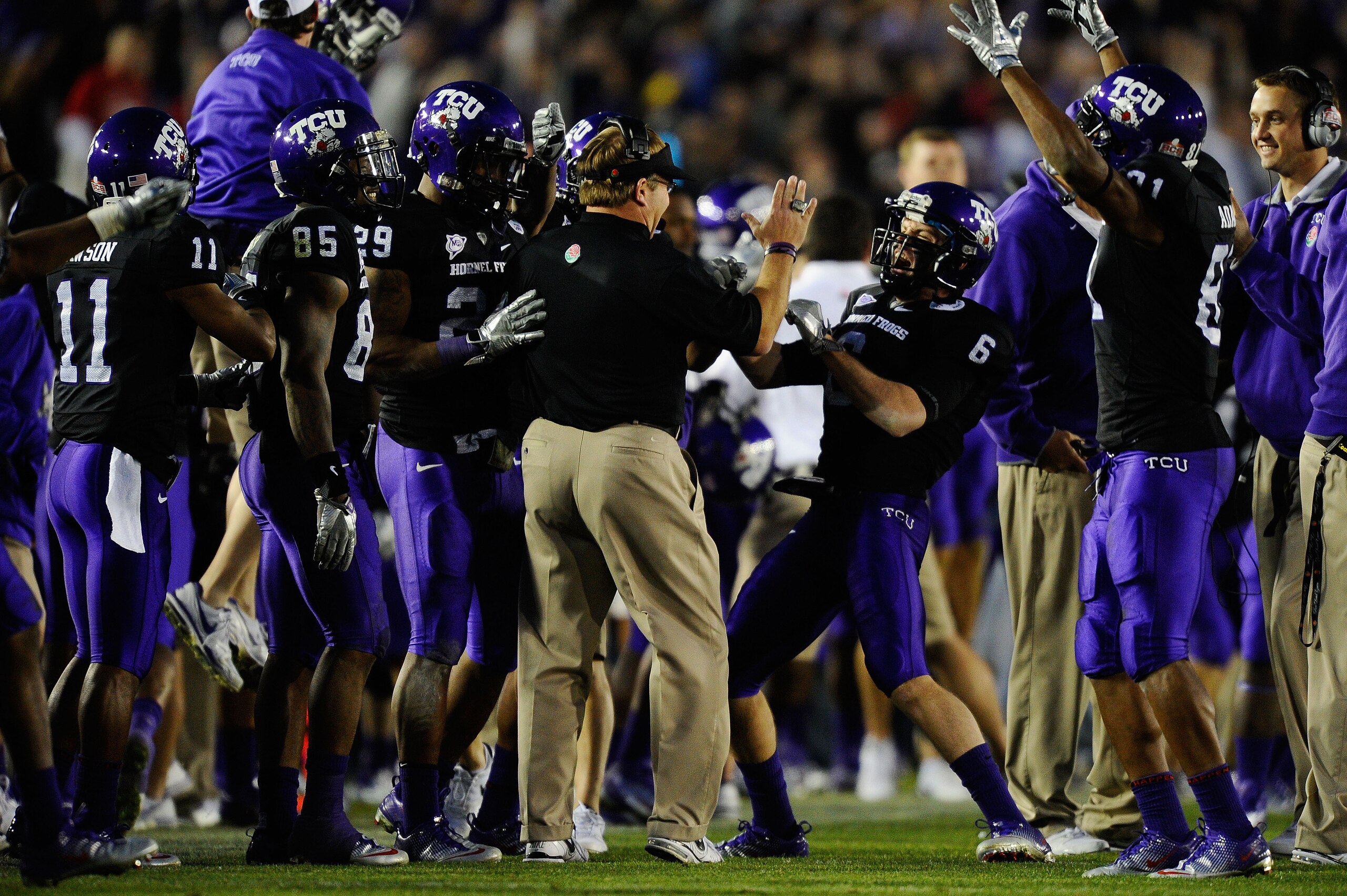 PASADENA, CA - JANUARY 01:  The TCU Horned Frogs celebrate after recovering an onside kick by the Wisconsin Badgers in the fourth quarter of the 97th Rose Bowl game on January 1, 2011 in Pasadena, California.  (Photo by Kevork Djansezian/Getty Images)