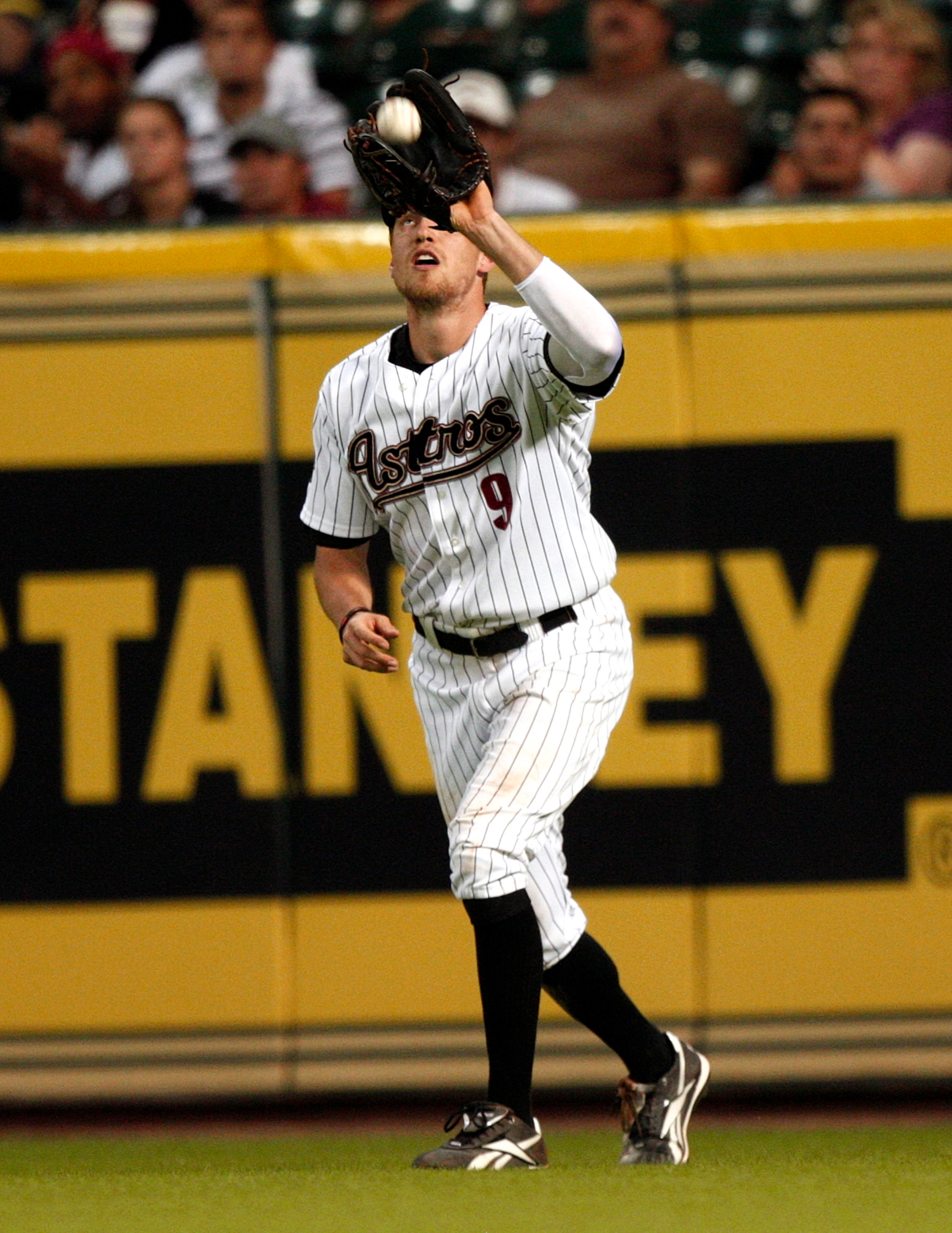 HOUSTON - AUGUST 30: Hunter Pence #9 of the Houston Astros fields a fly ball against the St. Louis Cardinlas at Minute Maid Park on August 30, 2010 in Houston, Texas. The Astros beat the Cardinals 3-0. (Photo by Bob Levey/Getty Images) HOUSTON - AUGUST 30: Hunter Pence #9 of the Houston Astros fields a fly ball against the St. Louis Cardinlas at Minute Maid Park on August 30, 2010 in Houston, Texas. The Astros beat the Cardinals 3-0. (Photo by Bob Levey/Getty Images)
