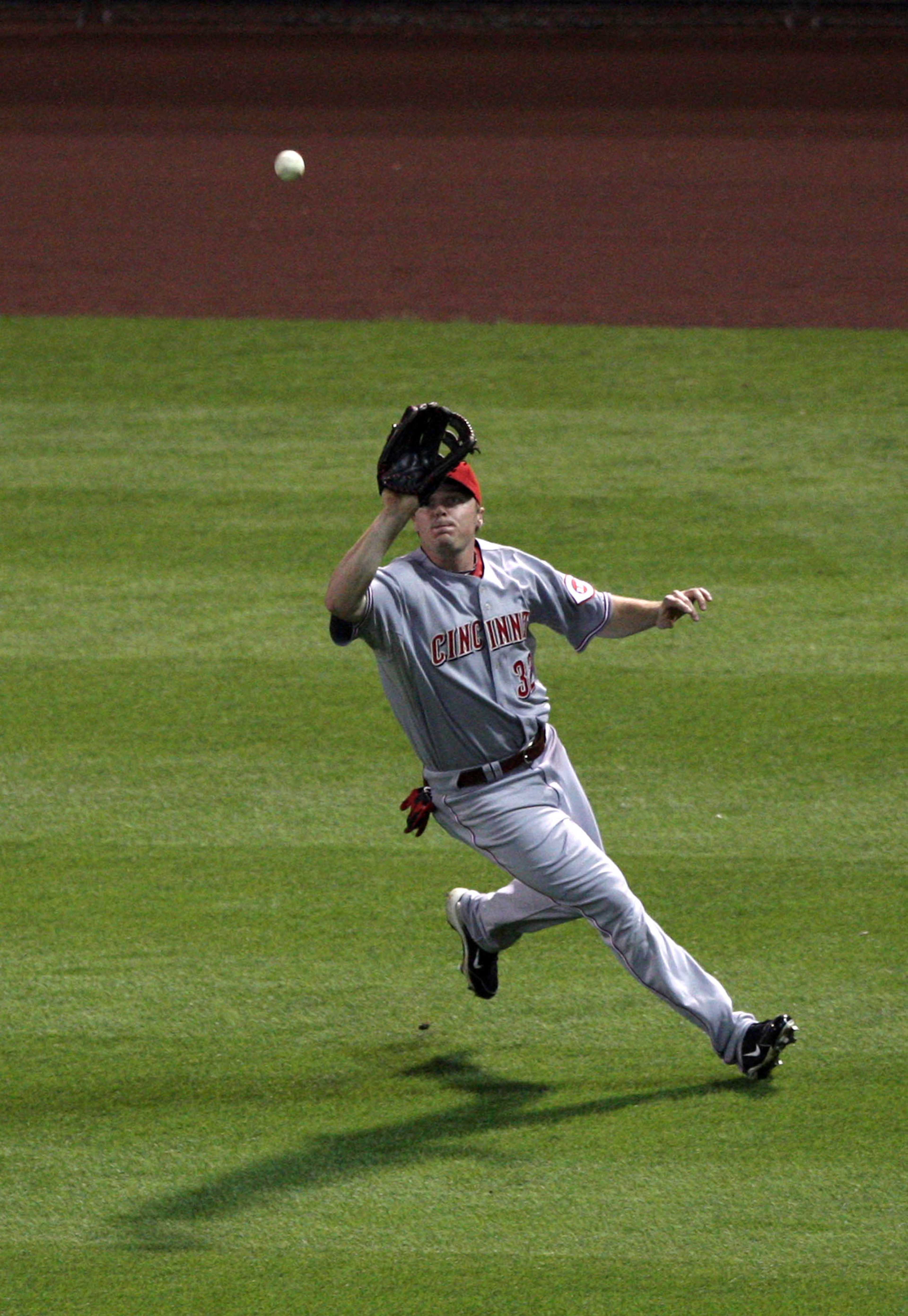 SAN DIEGO, CA - SEPTEMBER 24: Right Fielder Jay Bruce #32 of Cincinnati Reds fields a fly ball against the San Diego Padres during their MLB game on September 24, 2010 at PETCO Park in San Diego, California. Tony Gwynn #18 of the San Diego Padres scored SAN DIEGO, CA - SEPTEMBER 24: Right Fielder Jay Bruce #32 of Cincinnati Reds fields a fly ball against the San Diego Padres during their MLB game on September 24, 2010 at PETCO Park in San Diego, California. Tony Gwynn #18 of the San Diego Padres scored