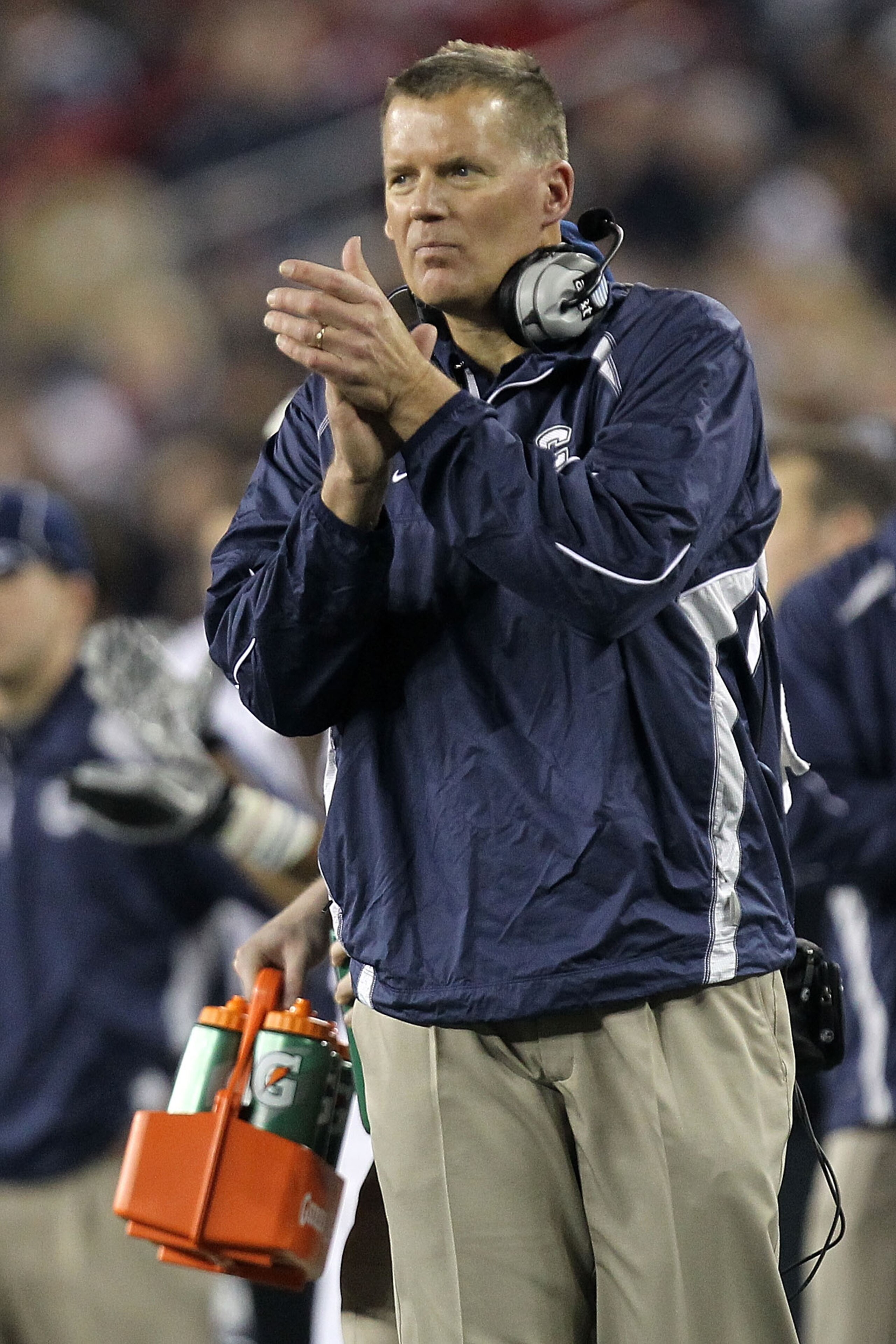 GLENDALE, AZ - JANUARY 01:  Head coach Randy Edall of the Connecticut Huskies claps in the first half while taking on the Oklahoma Sooners during the Tostitos Fiesta Bowl at the Universtity of Phoenix Stadium on January 1, 2011 in Glendale, Arizona.  (Pho