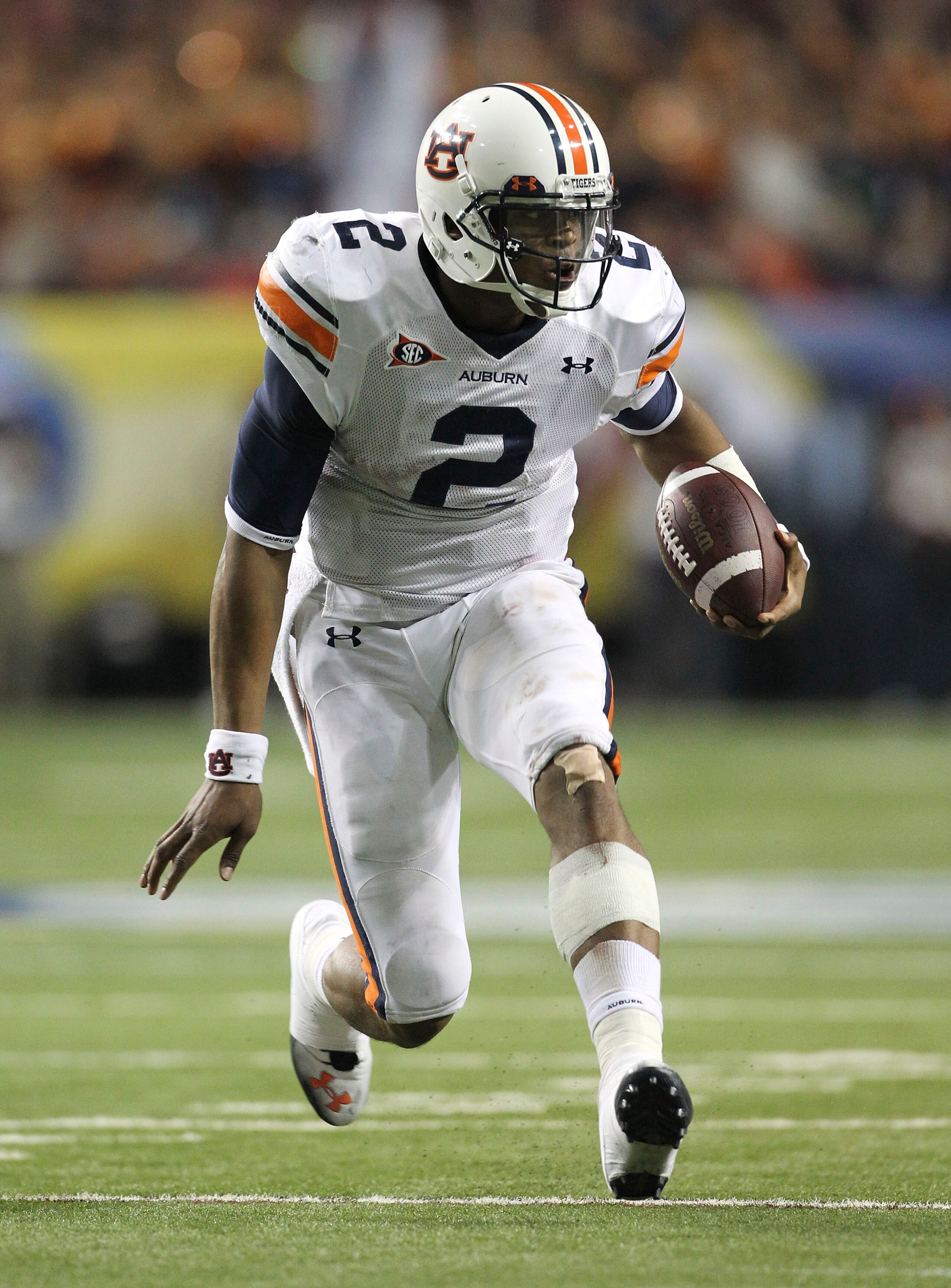 ATLANTA - DECEMBER 04:  Quarterback Cam Newton #2 of the Auburn Tigers runs with the ball during the 2010 SEC Championship against the South Carolina Gamecocks at Georgia Dome on December 4, 2010 in Atlanta, Georgia.  (Photo by Mike Zarrilli/Getty Images)
