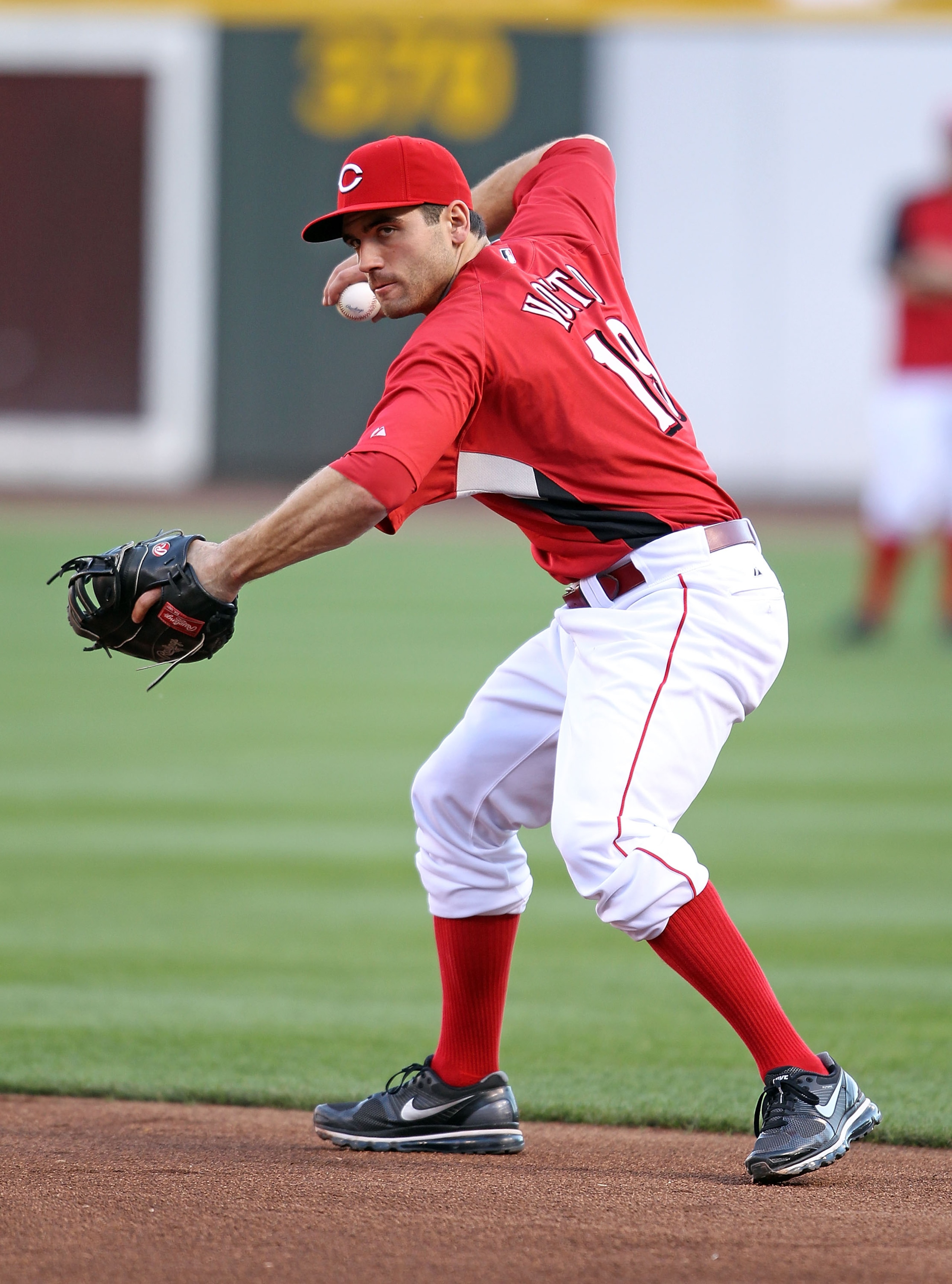 CINCINNATI - OCTOBER 10:  Joey Votto #19 of the Cincinnati Reds participates in batting practice before the start of  Game 3 of the NLDS against the Philadelphia Phillies  at Great American Ball Park on October 10, 2010 in Cincinnati, Ohio.  (Photo by And
