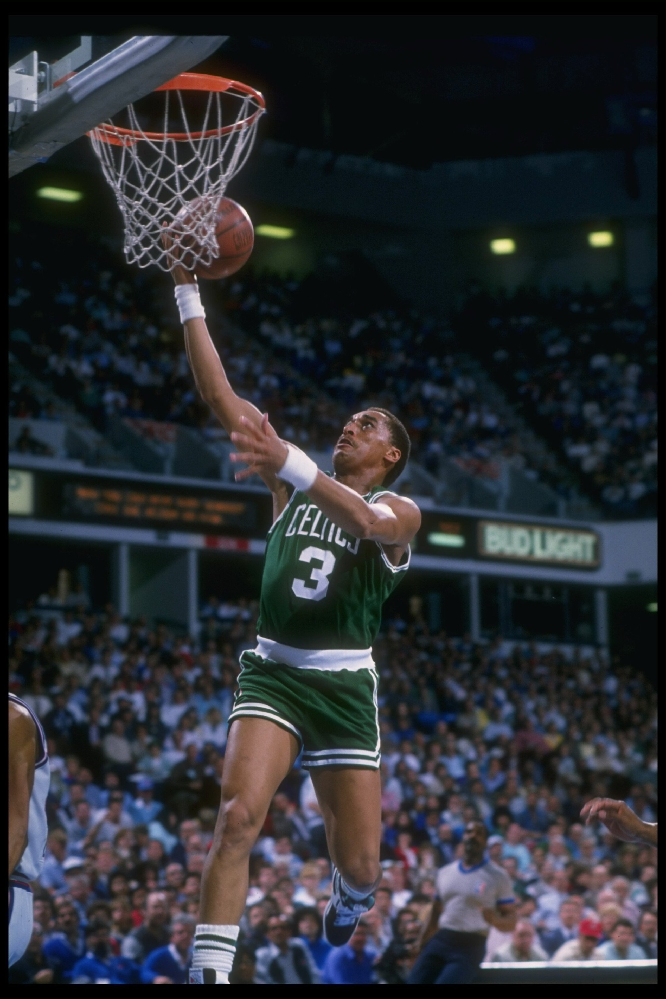 1988-1989: Dennis Johnson of the Boston Celtics sinks the ball during a game. Mandatory Credit: Otto Greule Jr. /Allsport 1988-1989: Dennis Johnson of the Boston Celtics sinks the ball during a game. Mandatory Credit: Otto Greule Jr. /Allsport