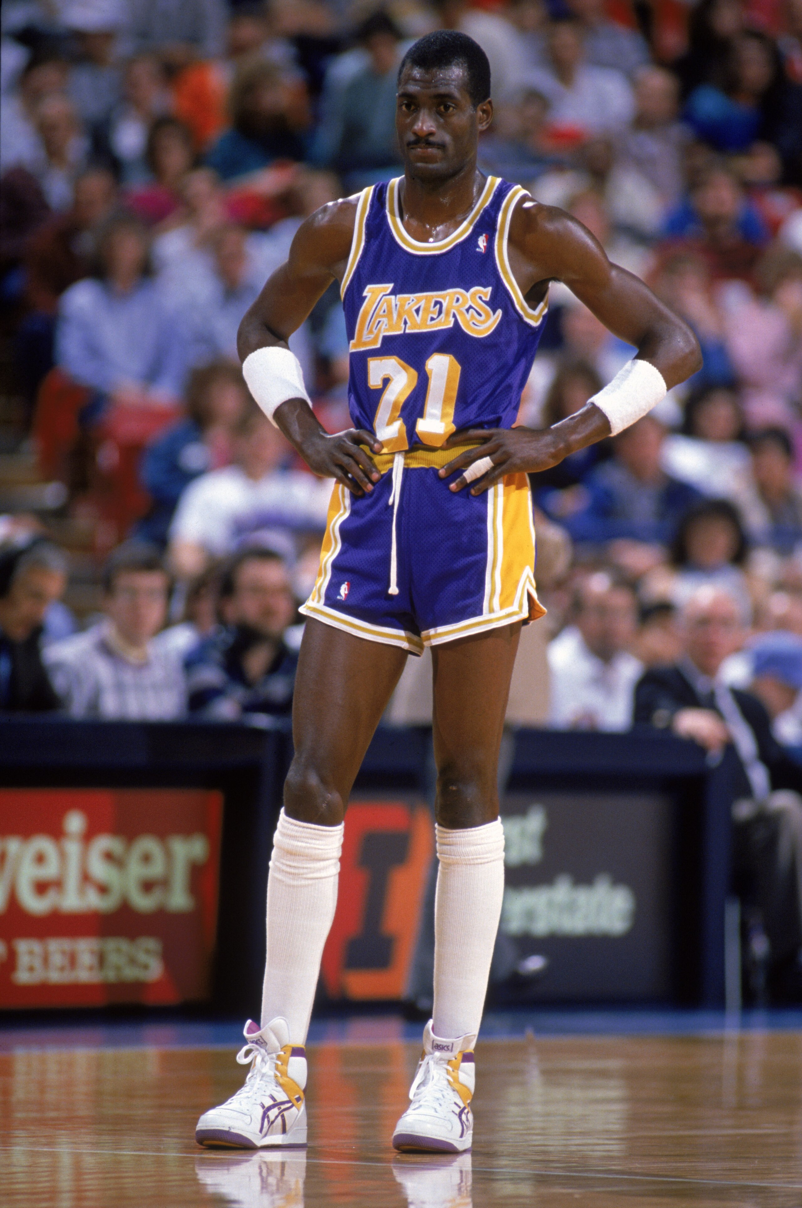 SACRAMENTO, CA - 1988: Michael Cooper #21 of the Los Angeles Lakers stands on the court during an NBA game against the Sacramento Kings at the Arco Arena in Sacramento, California in 1988. (Photo by: Otto Greule Jr/Getty Images) SACRAMENTO, CA - 1988: Michael Cooper #21 of the Los Angeles Lakers stands on the court during an NBA game against the Sacramento Kings at the Arco Arena in Sacramento, California in 1988. (Photo by: Otto Greule Jr/Getty Images)