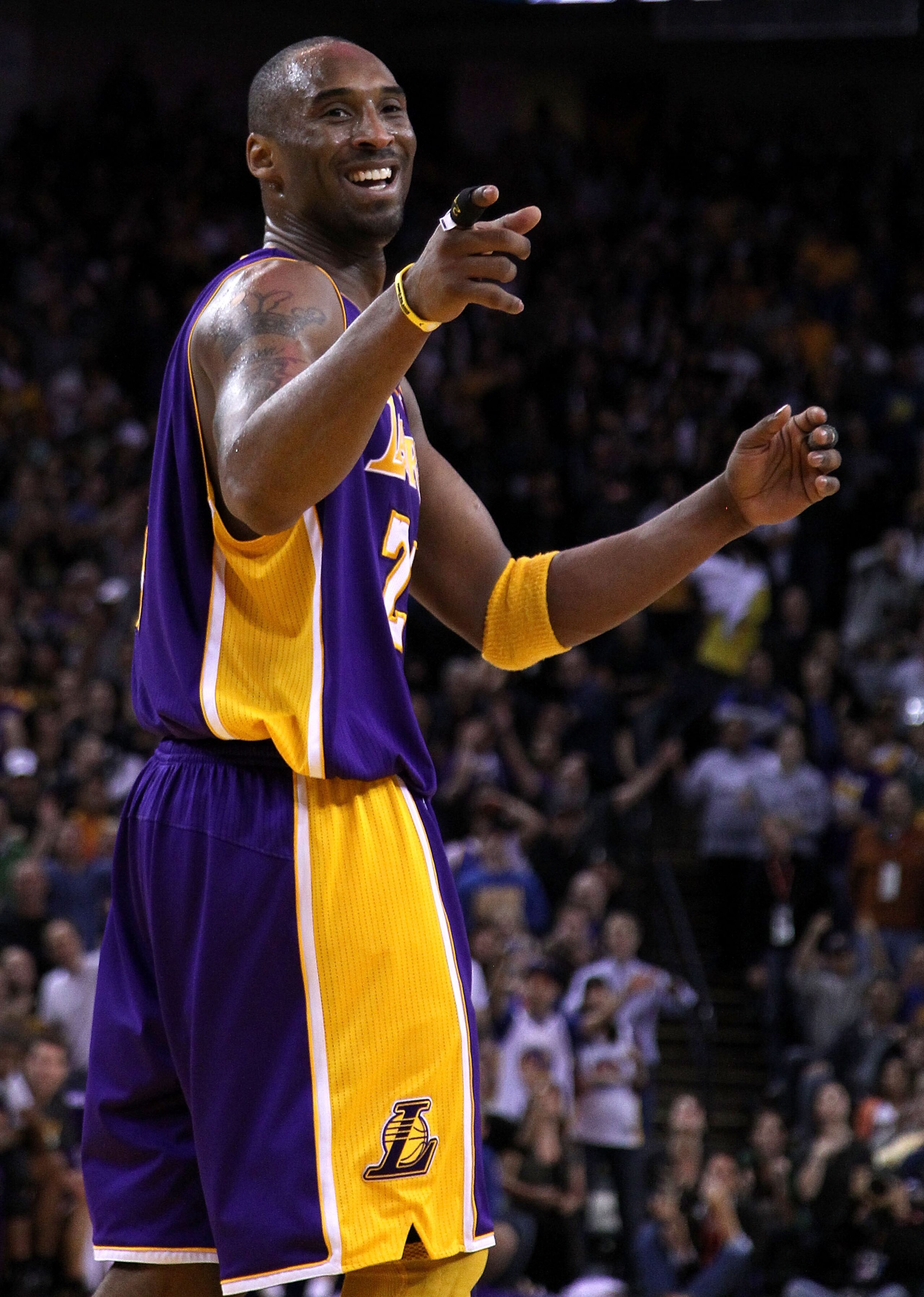OAKLAND, CA - JANUARY 12: Kobe Bryant #24 of the Los Angeles Lakers smiles during their game against the Golden State Warriors at Oracle Arena on January 12, 2011 in Oakland, California. NOTE TO USER: User expressly acknowledges and agrees that, by downlo OAKLAND, CA - JANUARY 12: Kobe Bryant #24 of the Los Angeles Lakers smiles during their game against the Golden State Warriors at Oracle Arena on January 12, 2011 in Oakland, California. NOTE TO USER: User expressly acknowledges and agrees that, by downlo