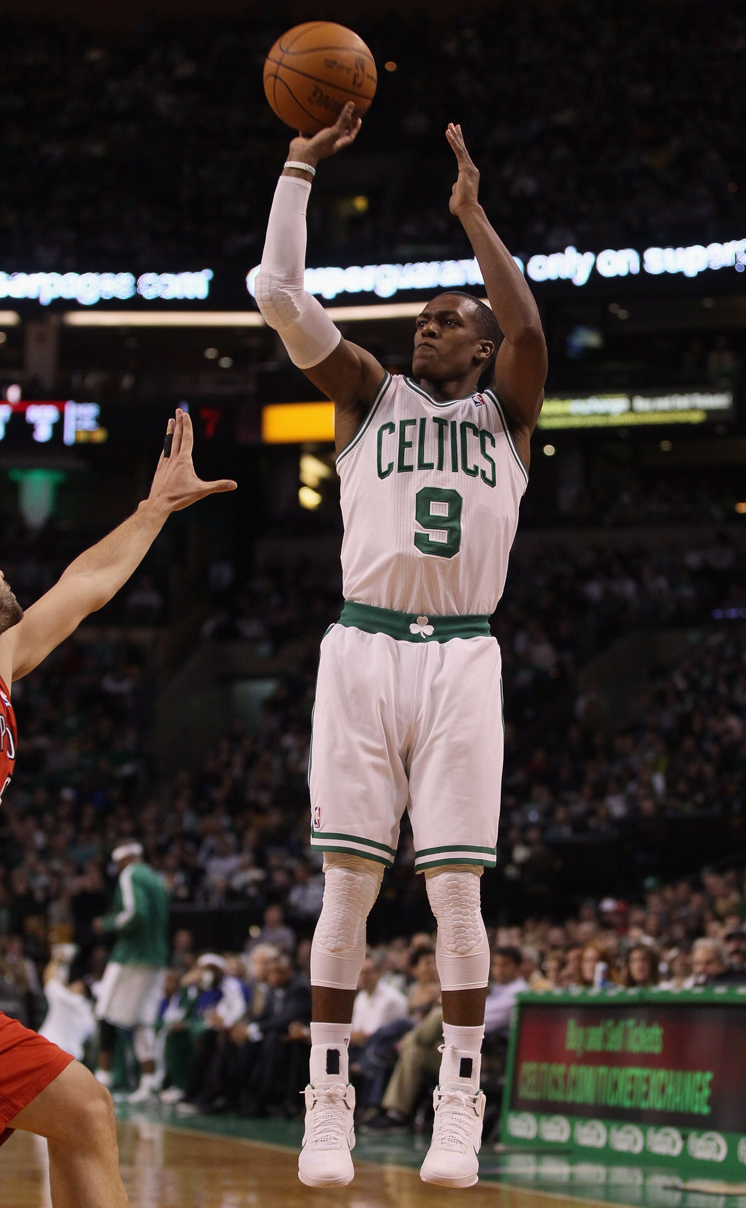 BOSTON, MA - JANUARY 07: Rajon Rondo #9 of the Boston Celtics takes a shot in the first half against the Toronto Raptors on January 7, 2011 at the TD Garden in Boston, Massachusetts. NOTE TO USER: User expressly acknowledges and agrees that, by downloadi BOSTON, MA - JANUARY 07: Rajon Rondo #9 of the Boston Celtics takes a shot in the first half against the Toronto Raptors on January 7, 2011 at the TD Garden in Boston, Massachusetts. NOTE TO USER: User expressly acknowledges and agrees that, by downloadi