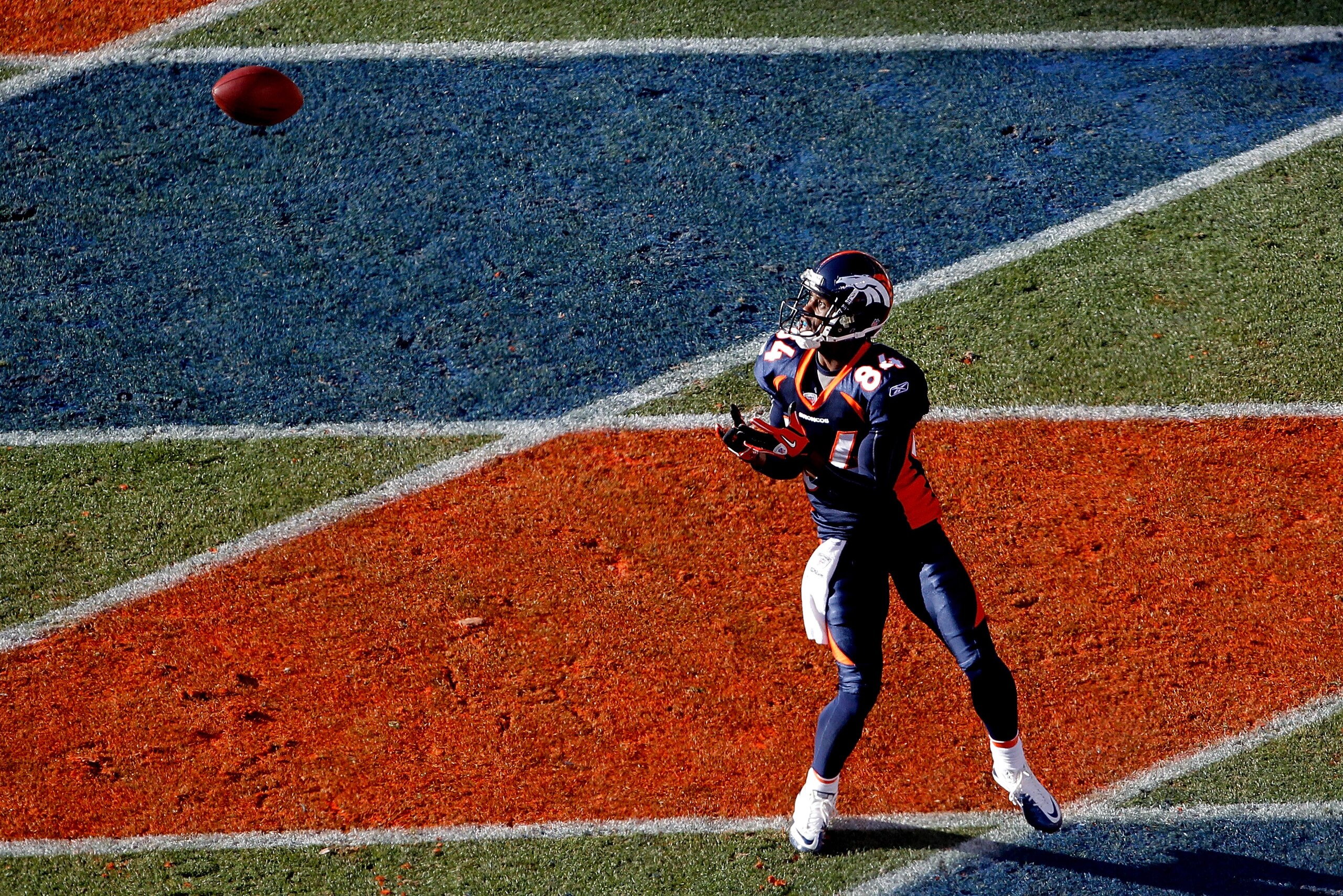 DENVER, CO - JANUARY 2:  Wide receiver Brandon Lloyd #84 of the Denver Broncos scores a touchdown against the San Diego Chargers during the first quarter at INVESCO Field at Mile High on January 2, 2011 in Denver, Colorado. (Photo by Justin Edmonds/Getty