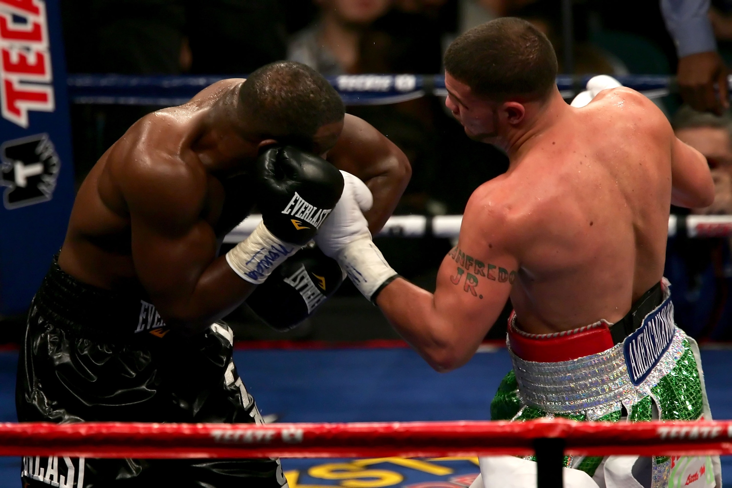 LAS VEGAS - DECEMBER 08:  (R-L) Peter Manfredo Jr. throws a left to the face of Jeff Lacy during their super welterweight fight at the MGM Grand Garden Arena on December 8, 2007 in Las Vegas, Nevada.  (Photo by John Gichigi/Getty Images)
