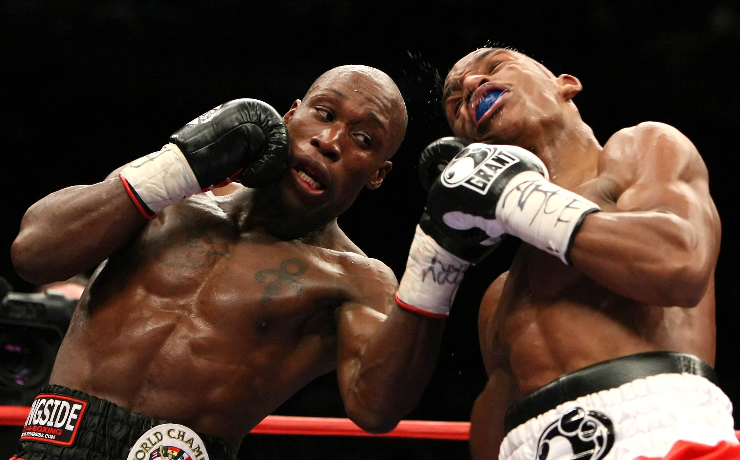 NEW YORK - JANUARY 19:  DeMarcus Corley (L) lands a left hand upper cut against Devon Alexander (R) during their WBC Continental Super Welterweight Championship bout at Madison Square Garden January 19, 2008 in New York City.  (Photo by Al Bello/Getty Ima