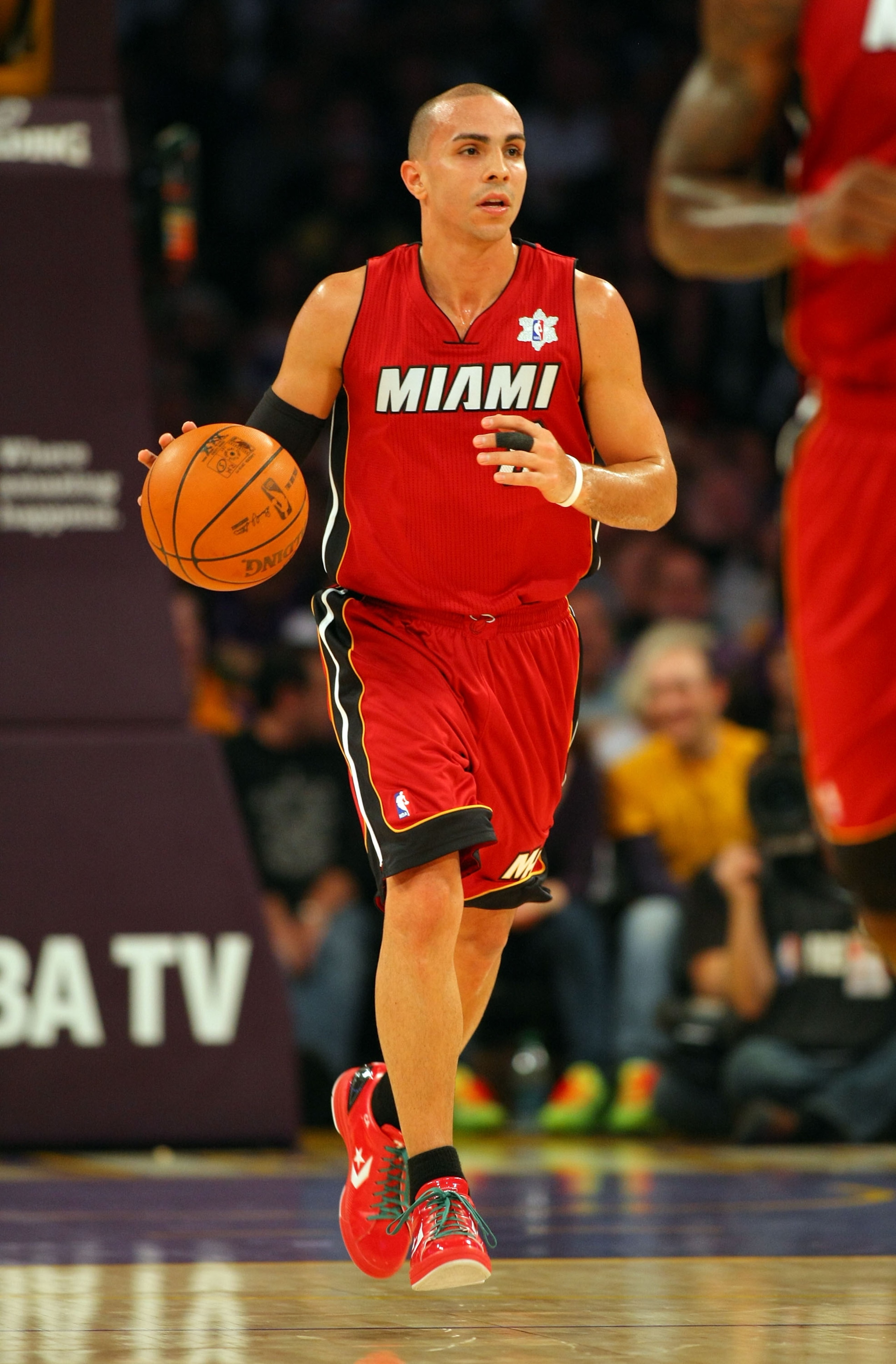 LOS ANGELES, CA - DECEMBER 25:  Carlos Arroyo #8 of the Miami Heat dribbles the ball upcourt during the NBA game against the Los Angeles Lakers at Staples Center on December 25, 2010 in Los Angeles, California. The Heat defeated the Lakers 96-80. NOTE TO