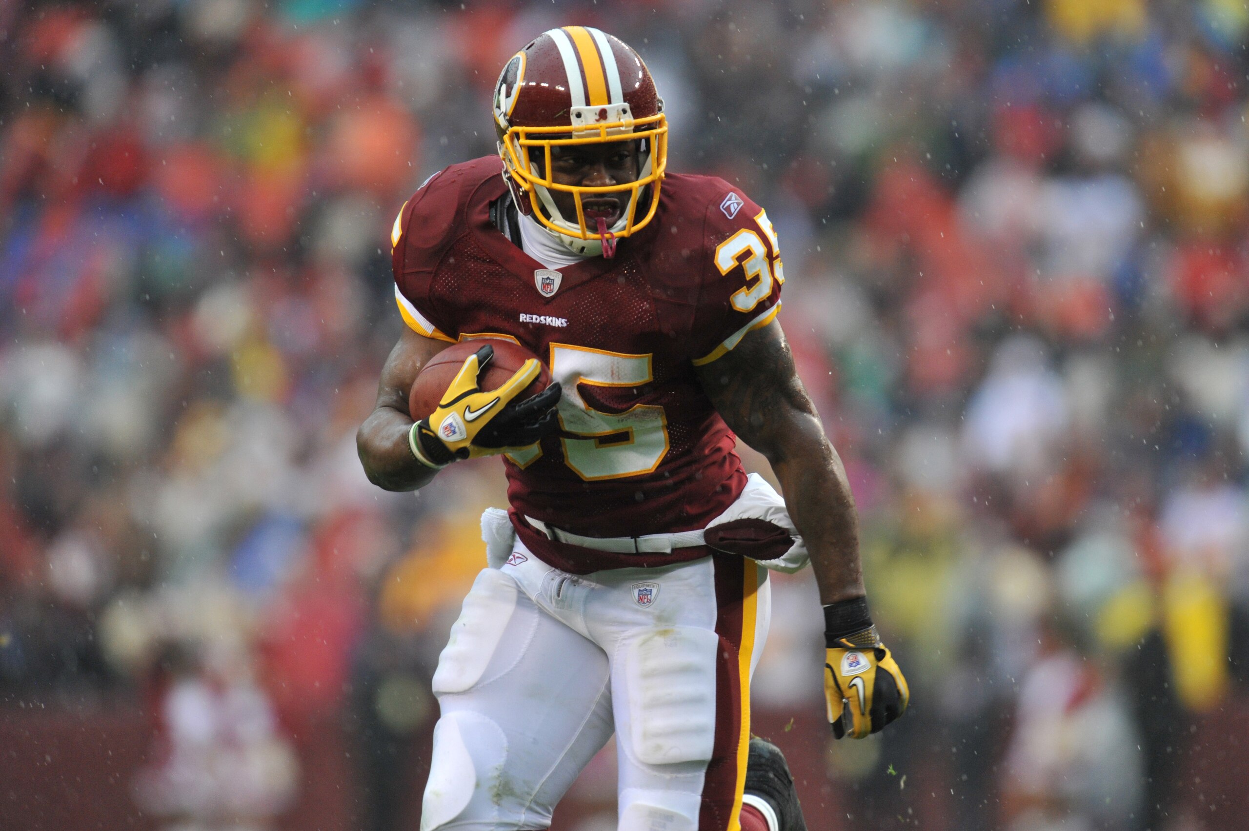 LANDOVER, MD - DECEMBER 12:  Keiland Williams #35 of the Washington Redskins runs the ball against the Tampa Bay Buccaneers  at FedExField on December 12, 2010 in Landover, Maryland. The Buccaneers defeated the Redskins 17-16. (Photo by Larry French/Getty
